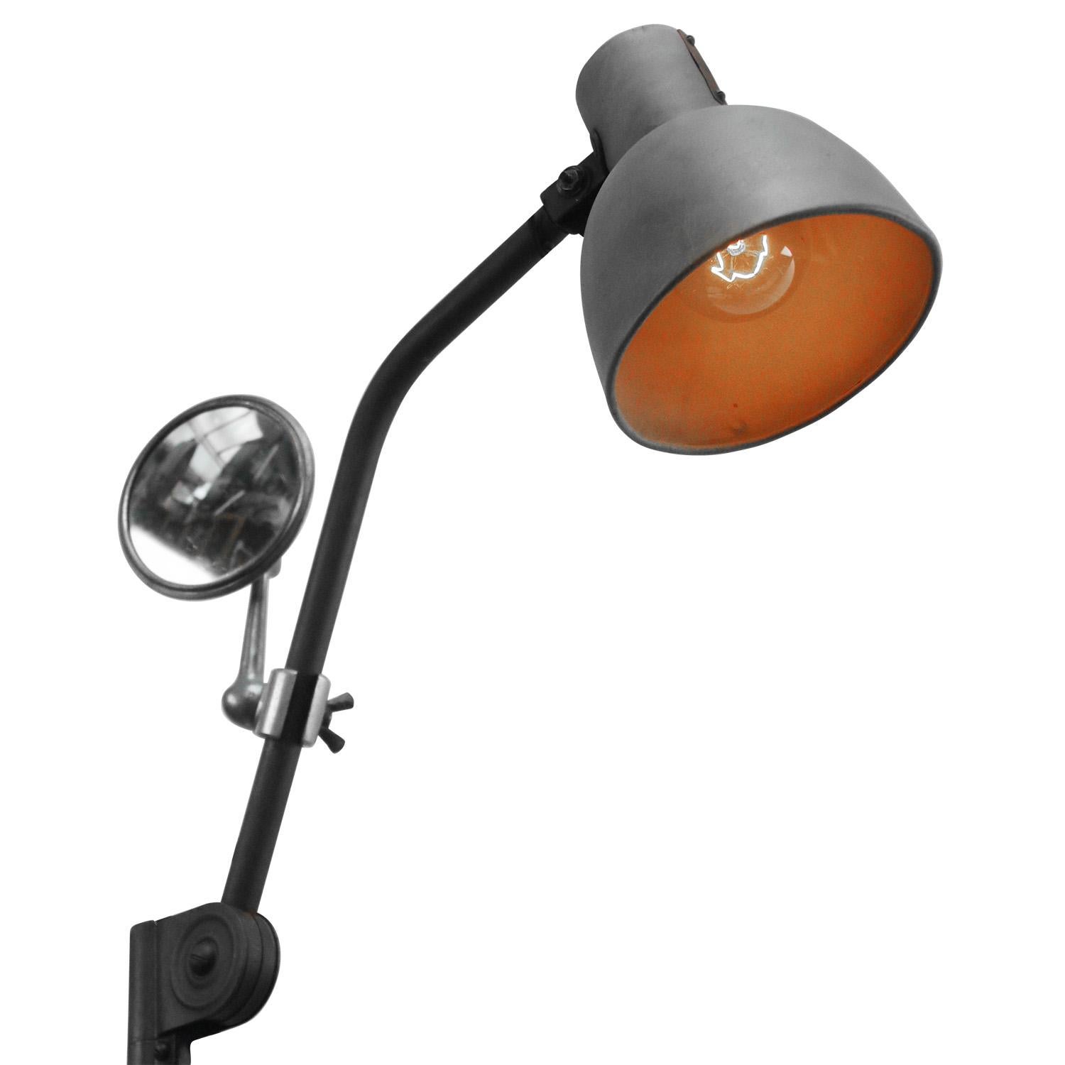 Grey metal industrial 2 arm work light by Hala, Zeist, The Netherlands. Design H. Busquet.
adjustable in height and angle + mirror
including plug and switch

Weight: 2.10 kg / 4.6 lb

Priced per individual item. All lamps have been made