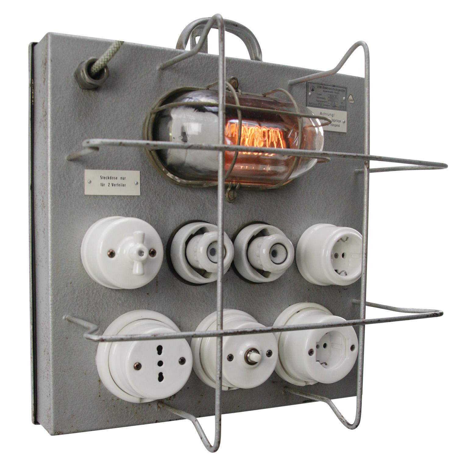 Vintage industrial grey metal control panel
Wall lamp, porcelain switches and plugs

1x E26 / E27

Weight: 5.90 kg / 13 lb

Priced per individual item. All lamps have been made suitable by international standards for incandescent light bulbs,