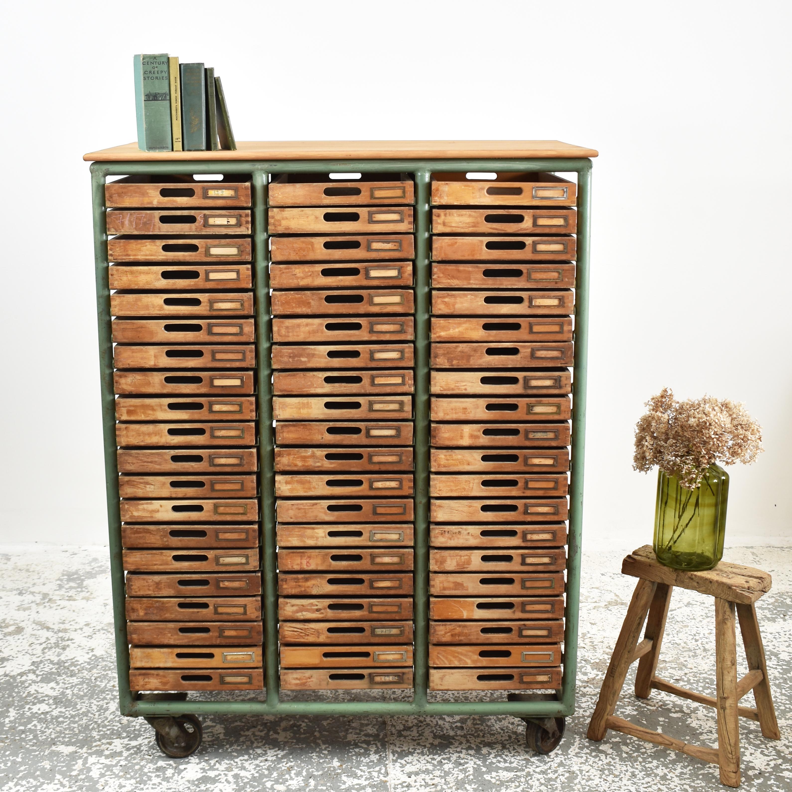 Vintage Industrial Haberdashery Storage Drawer Unit

An amazing statement set of factory drawers. These drawers were salvaged from a disused Hungarian factory. There are 60 drawers split into 3 tiers. The drawers are wooden with dovetails joints and
