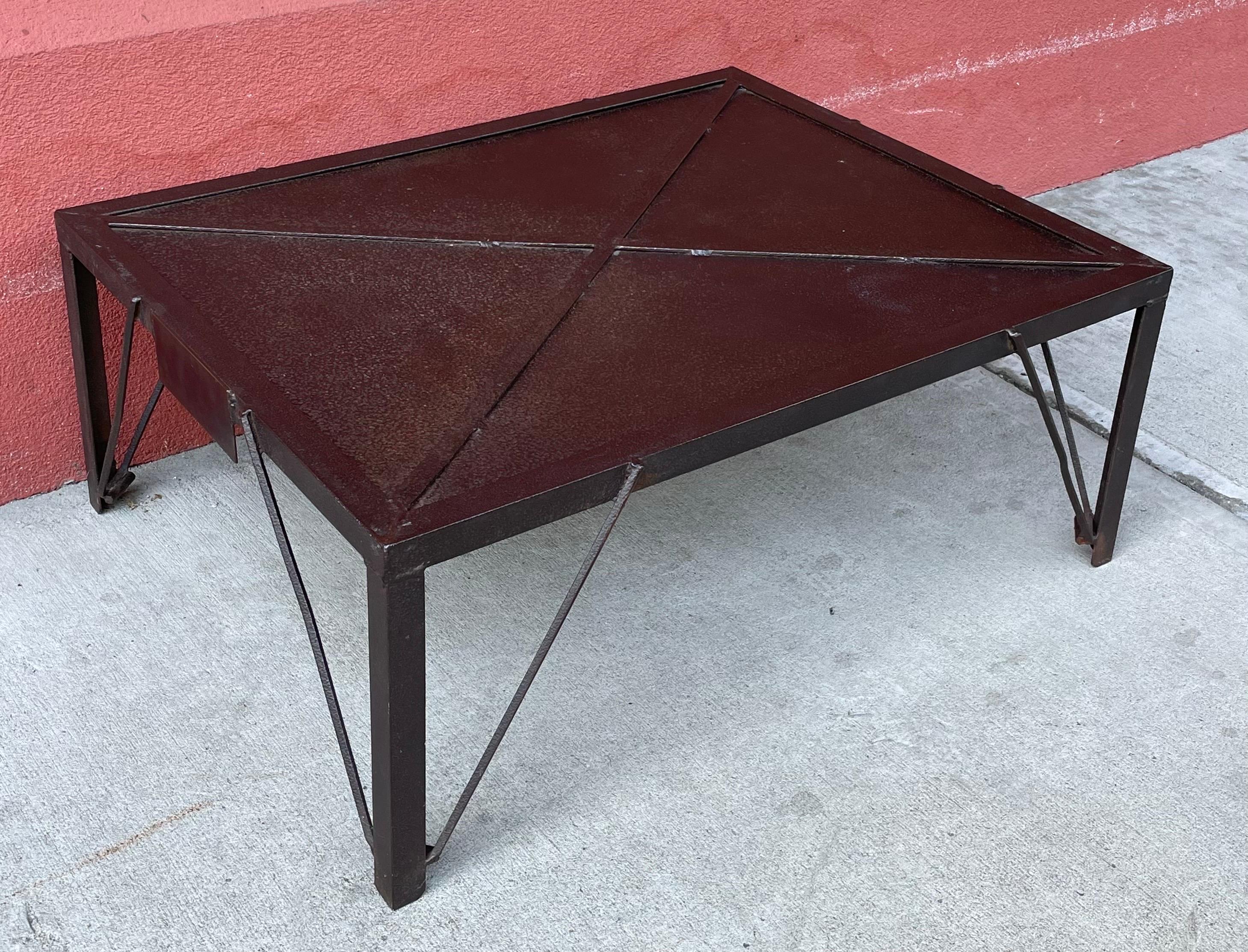 Vintage industrial coffee table or side table in heavy steel construction, artist unknown.