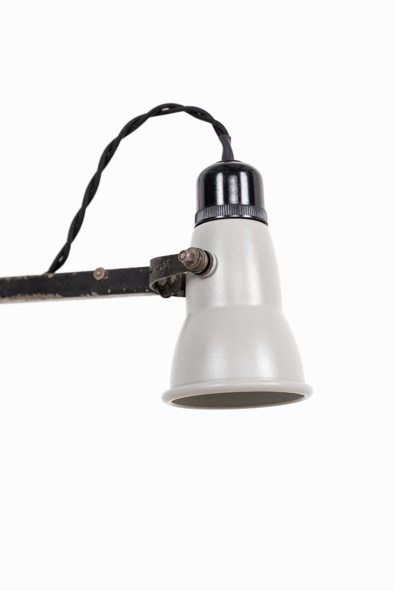 

Iconic Angelpoise navigation lamp used on WWII aircraft made by Herbert Terry & Sons. c.1940

Originally used in RAF aircraft such as the Lancaster Bomber, these military lamps were designed smaller in size due to onboard weight restrictions. Left