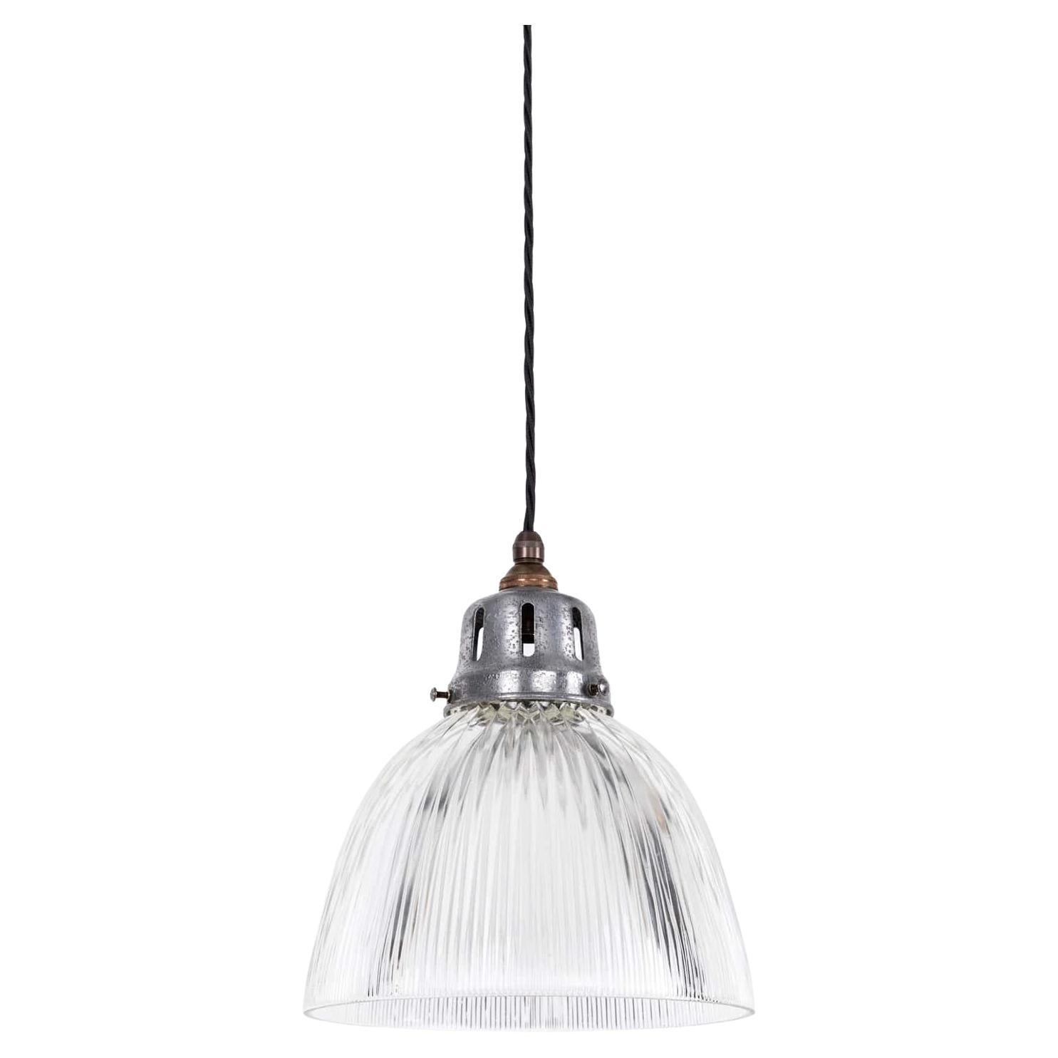 Lampe pendante industrielle vintage en verre prismatique Holophane. 1920
