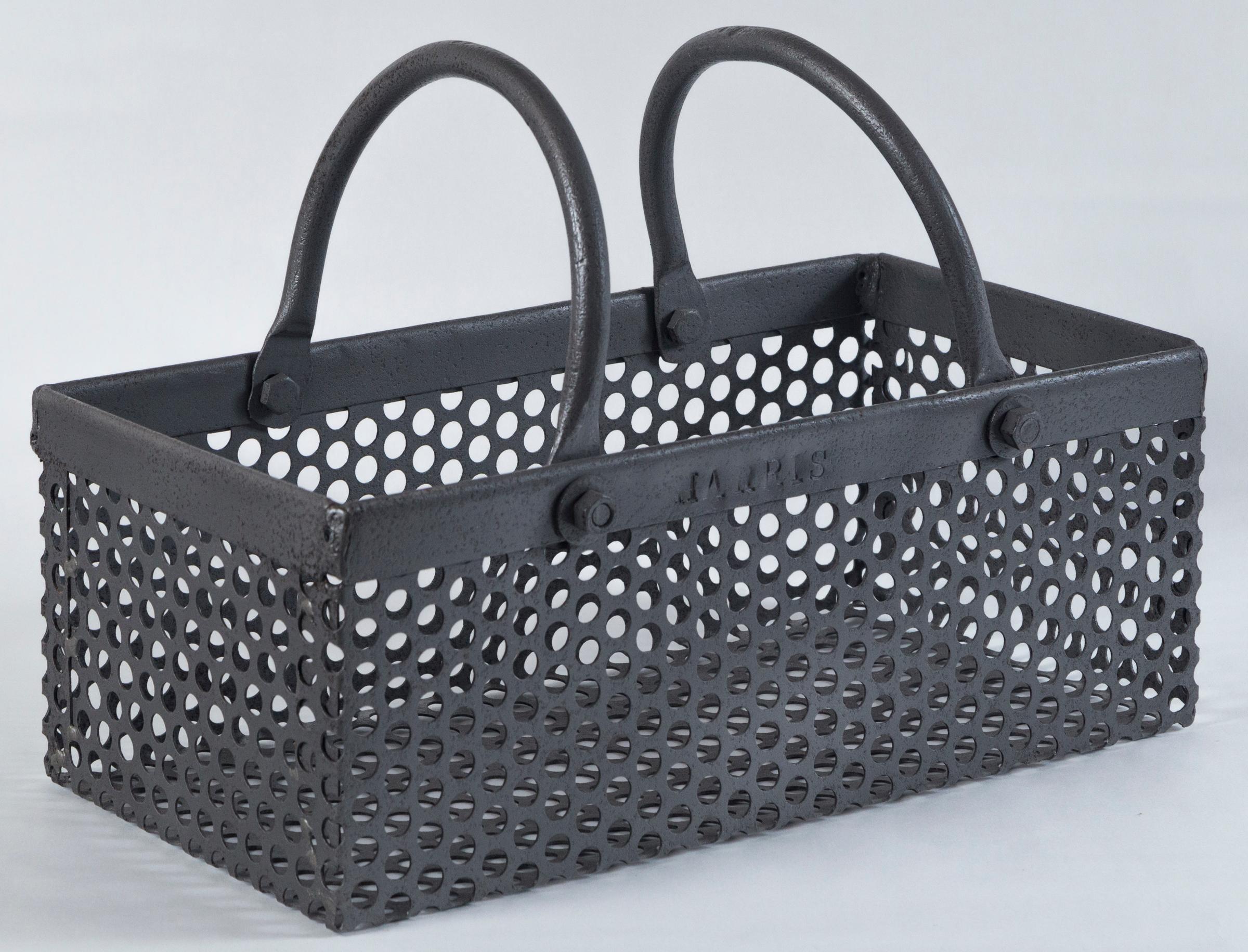 Vintage industrial iron basket, 20th century. Perforated body with two handles. Stamped 'HARRIS’.