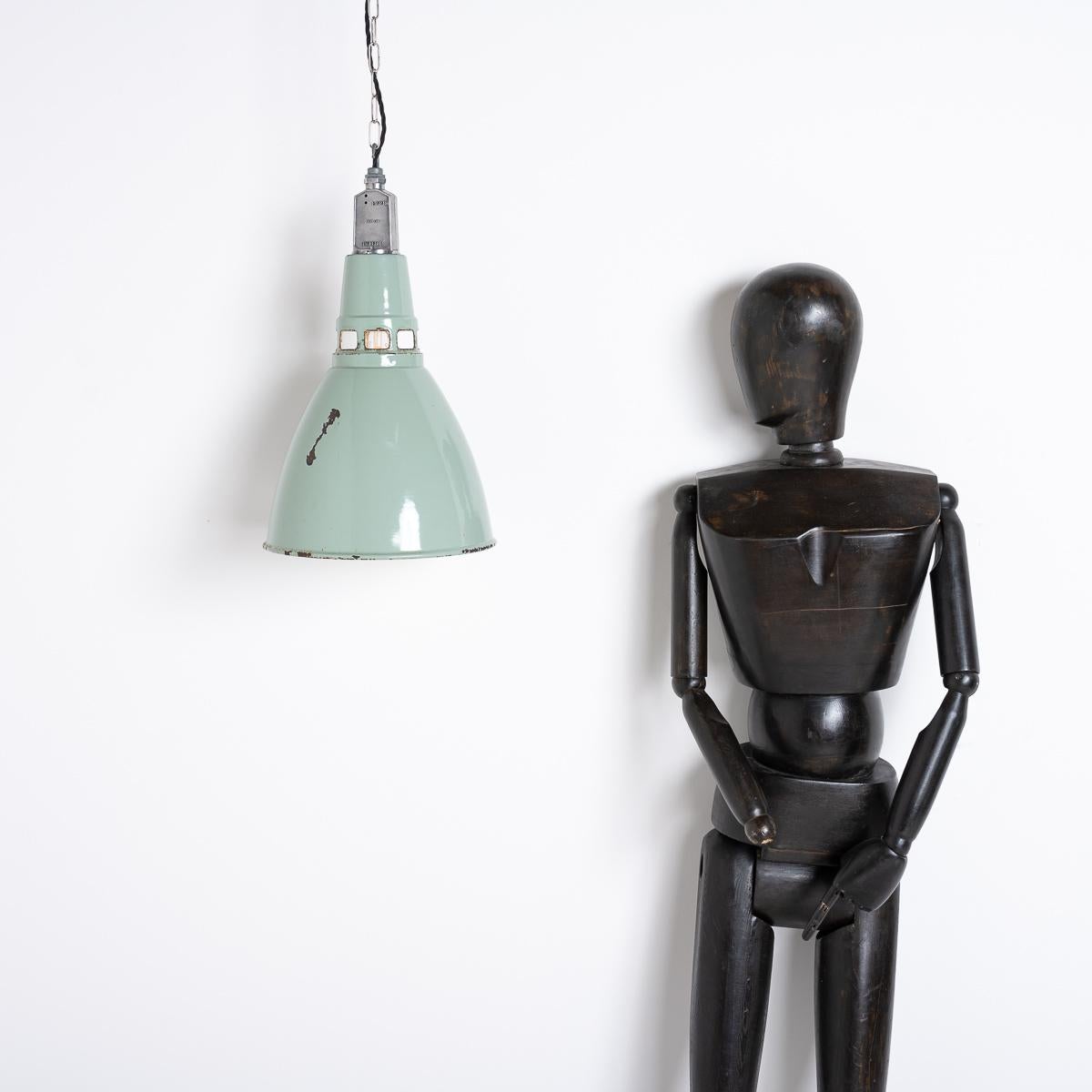 Salvaged industrial factory pendants in a wonderful form and colour manufactured in Great Britain circa 1950 by Thorlux.

Hard to believe these were designed and manufactured for industrial settings, a reminder of the quality and effort that used to