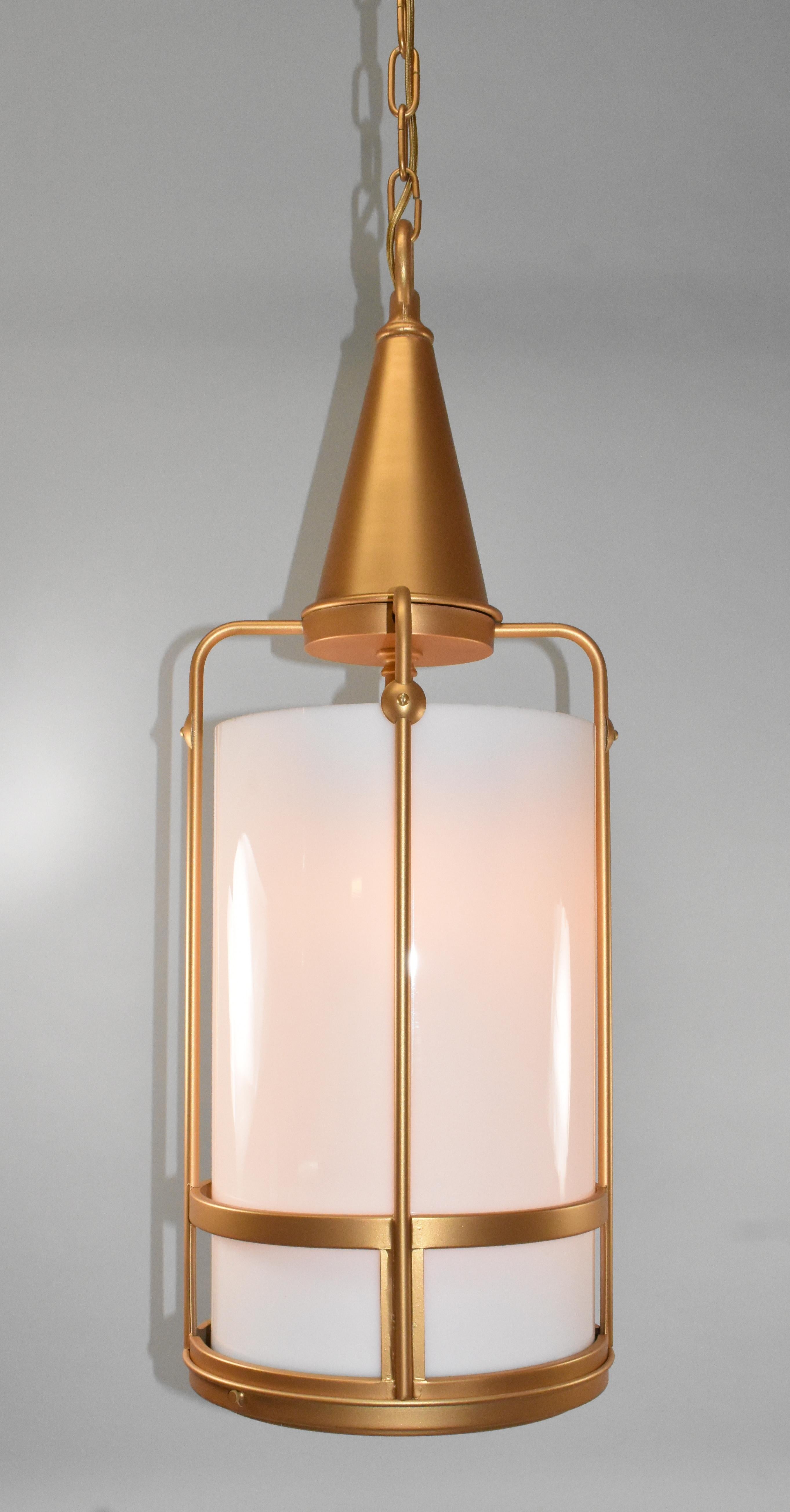 Vintage circa 1940s gold and opaque glass cylinder column chandelier pendant. Cage body with cone shape top that has decorative gold ball details. Four sockets in interior.