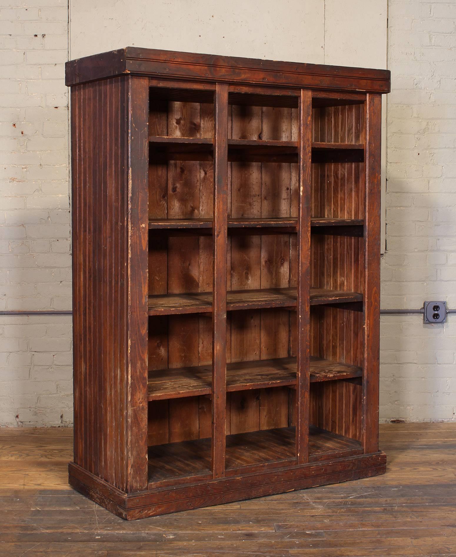 Vintage industrial shelved wooden storage cabinet from Connecticut factory. Measures: 46 1/4