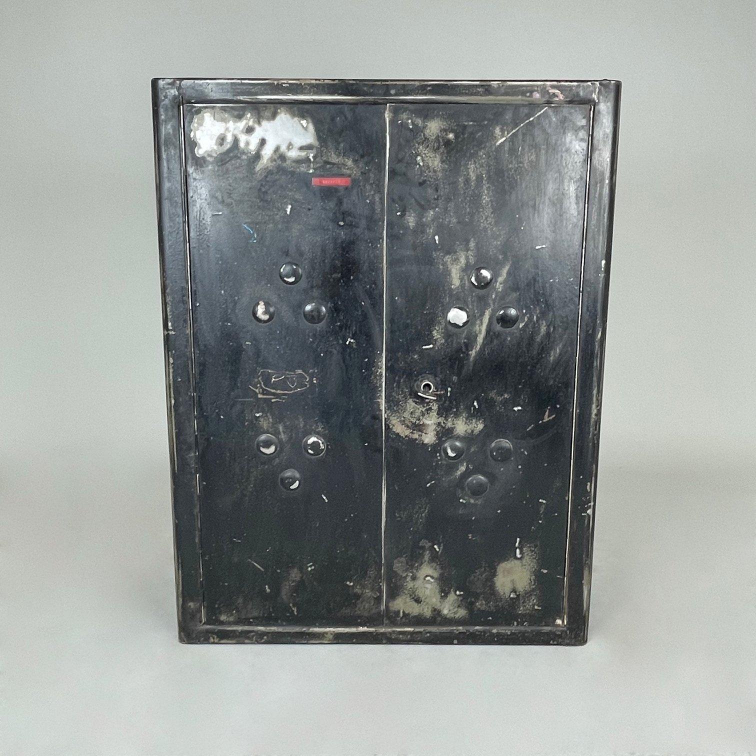 Vintage industrial tool cabinet saved from a tool factory in Poland. All parts are original, including the locking system and key. Can be hung on the wall or placed anywhere. The surface is completely cleaned and brushed.