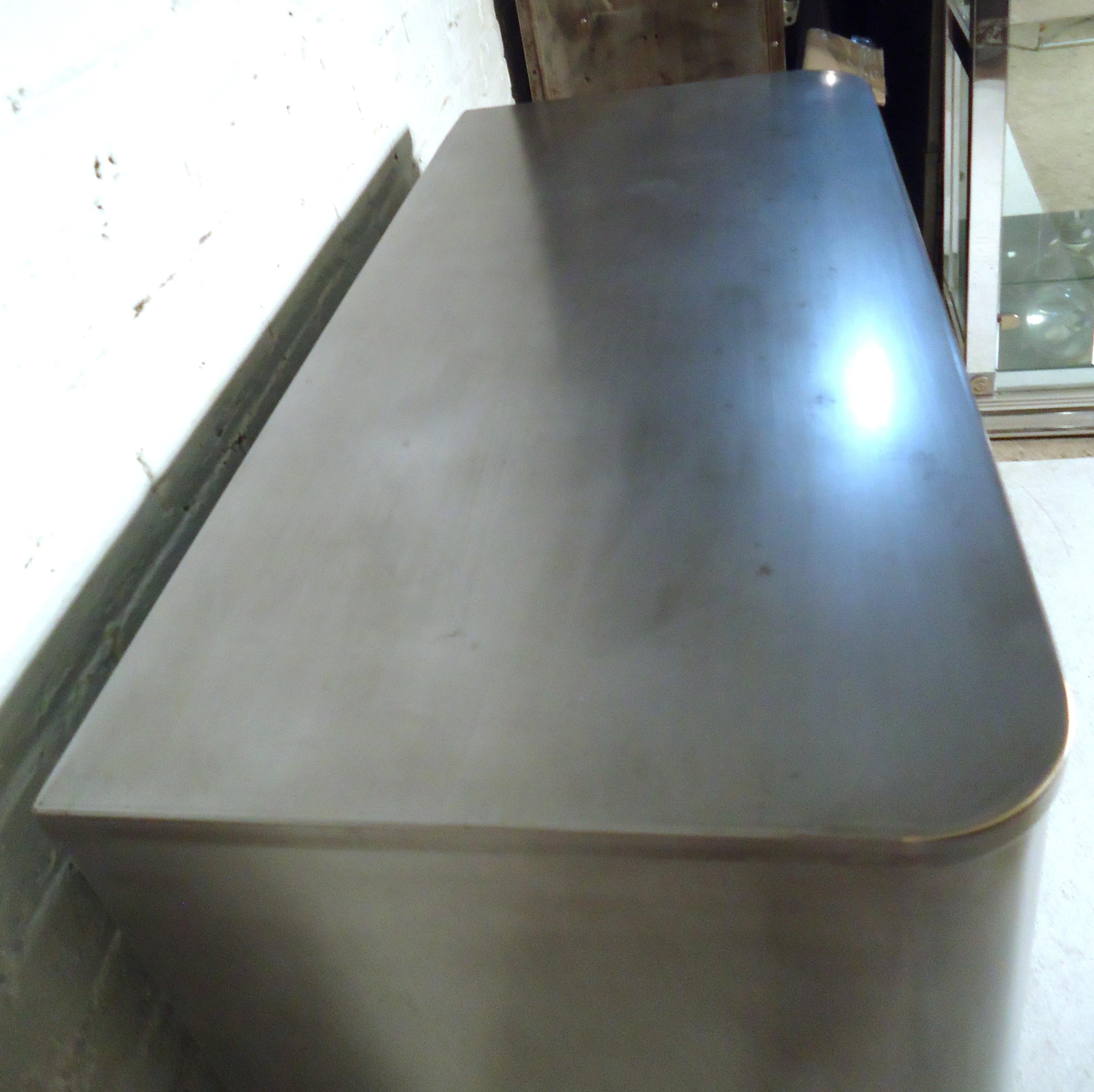 Industrial Simmons dresser featuring a wood bottom, metal handles, three small drawers, three large drawers, and a spacious storage cabinet.

(Please confirm item location - NY or NJ - with dealer).
