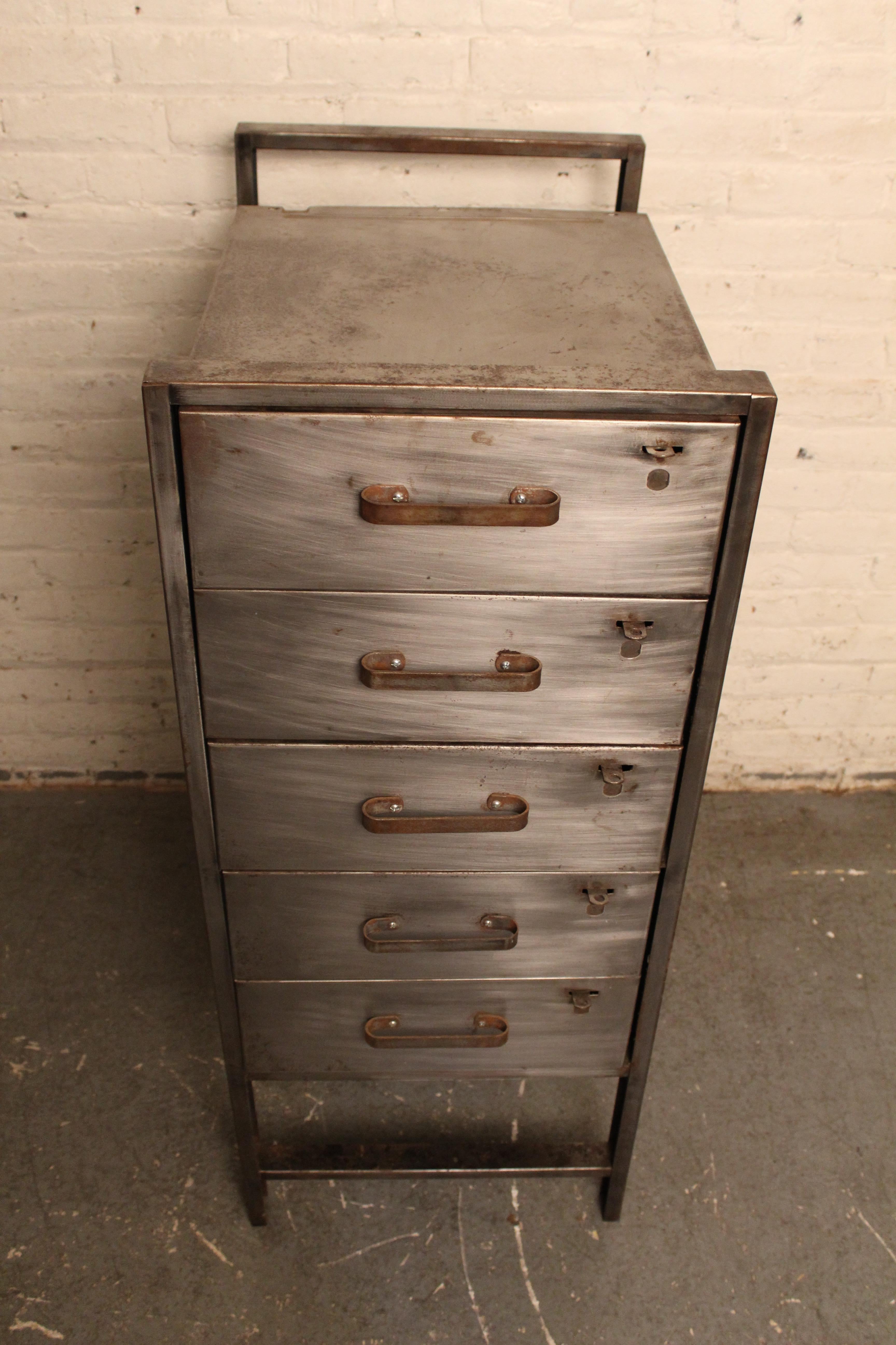 Make a bold statement in your space with this impressively robust industrial flat file. Featuring all-metal construction and a unique open frame design, it houses five pull-out drawers to provide plenty of options for organization and storage. The