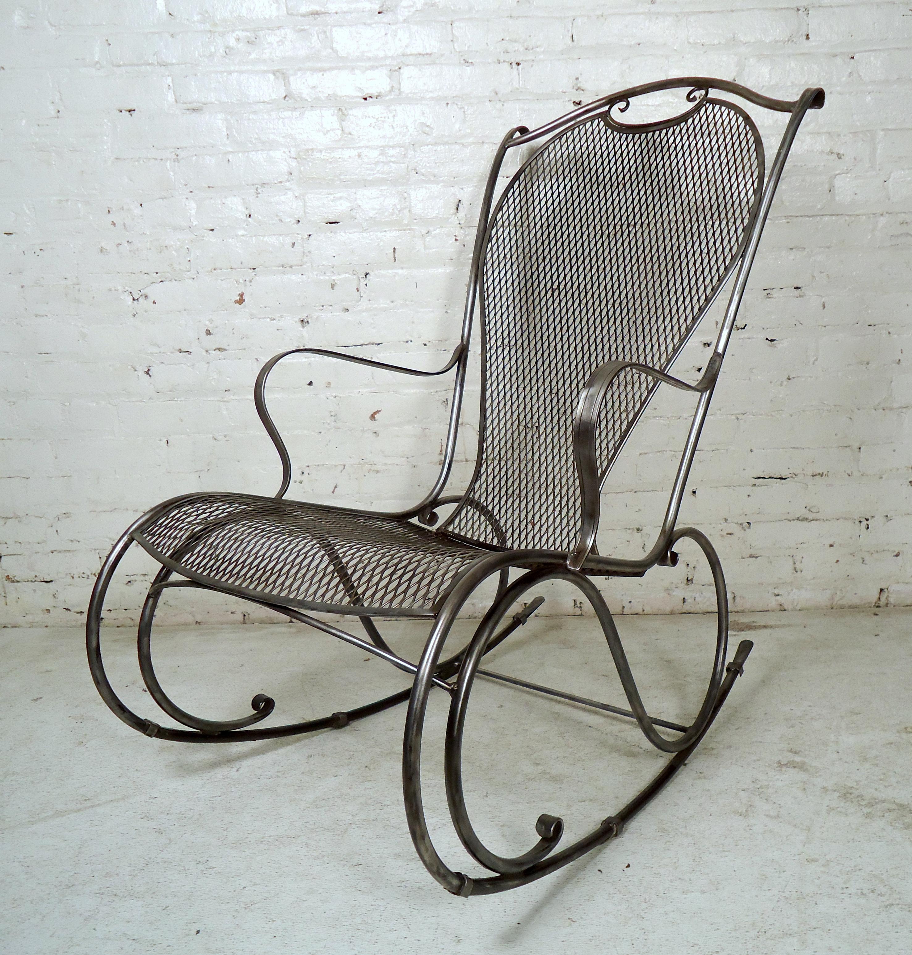 Gorgeous vintage metal rocker features a mesh seat and back, all stripped down and restored to a bare metal style finish.

(Please confirm item location - NY or NJ - with dealer).