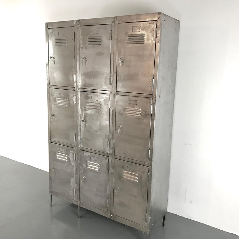 Vintage Industrial Nine Compartment Stripped and Polished Steel School