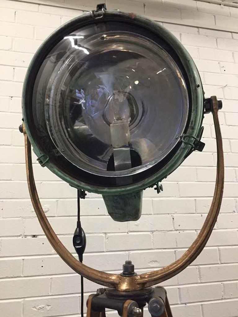 This is a beautiful, rare and unique, high end piece of lighting called a Novalux Project or by General Electric. 

This all copper light is all original. The lens is in good shape, as is the reflector inside the light. It is mounted by a solid