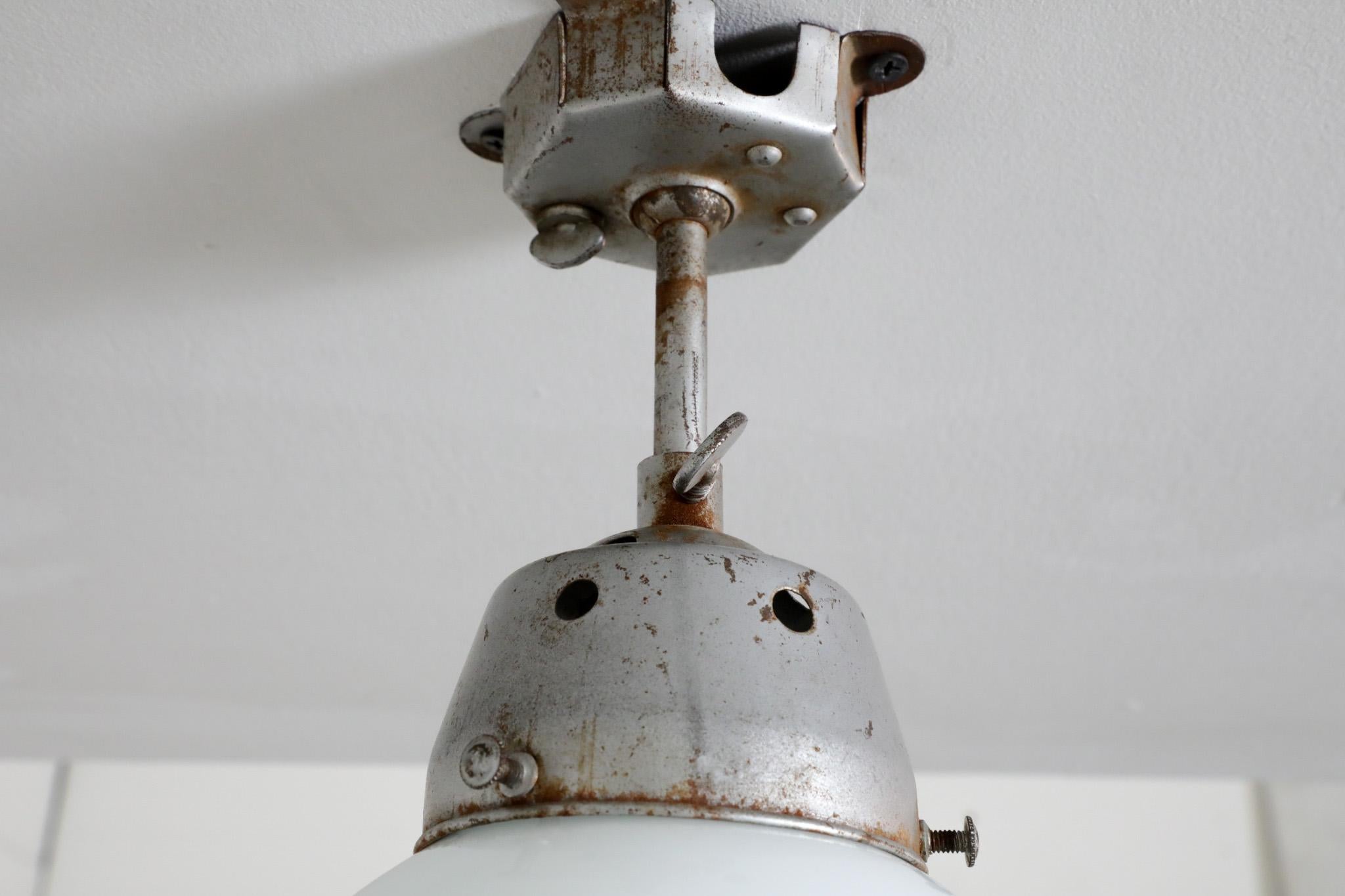 Vintage Industrial Opaline Glass Globe Light with Raw Metal Mounting For Sale 10