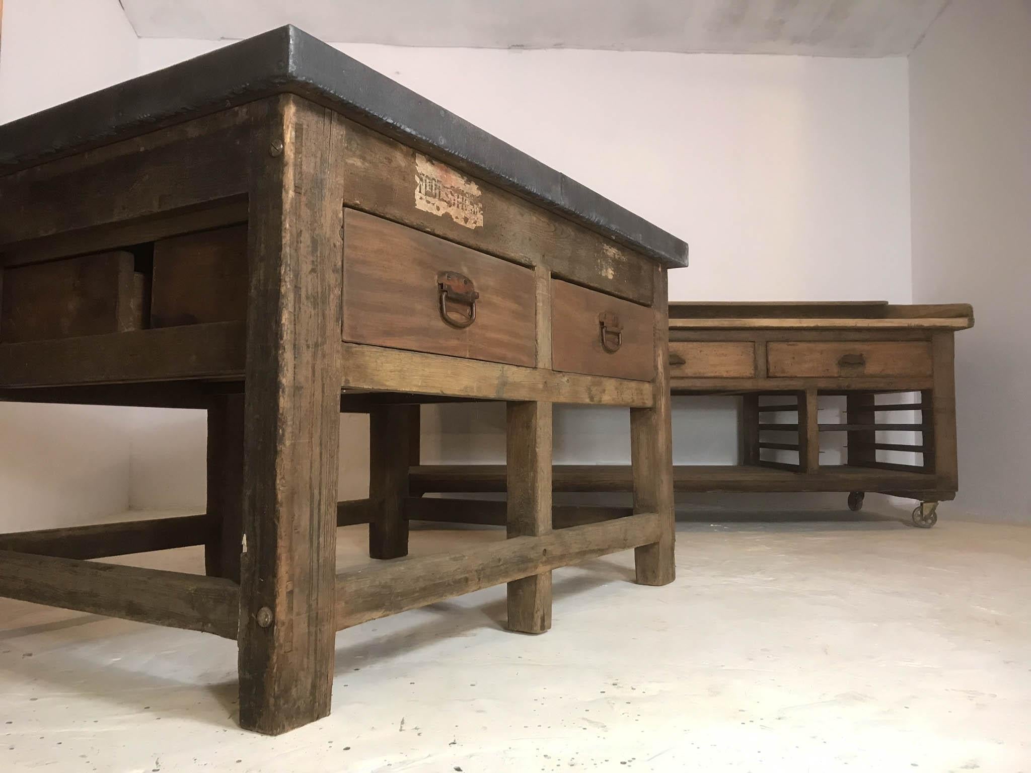 Fantastic early 20th Century double sided pine printers table with hardwood drawers. This piece was a lucky find in an old printers factory in Sheffield; which has laid dormant for years, but is now subject to development.
It is an ideal centrepiece