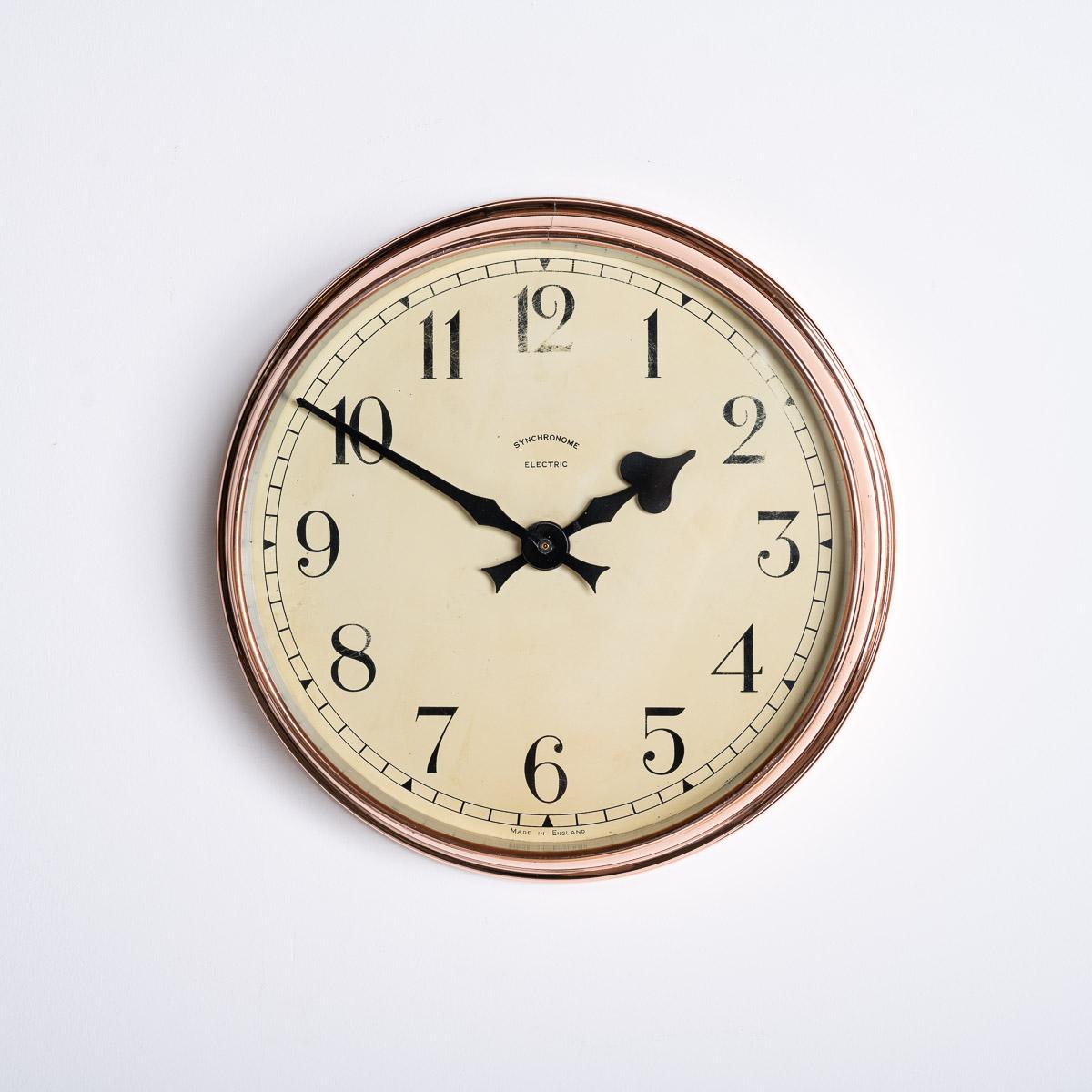 SYNCHRONOME VINTAGE INDUSTRIAL COPPER CLOCK

A beautiful copper industrial clock by Synchronome.

English Made circa 1930

Synchronome were the preeminent clock maker throughout the early & mid 20th century, commercially producing the most accurate