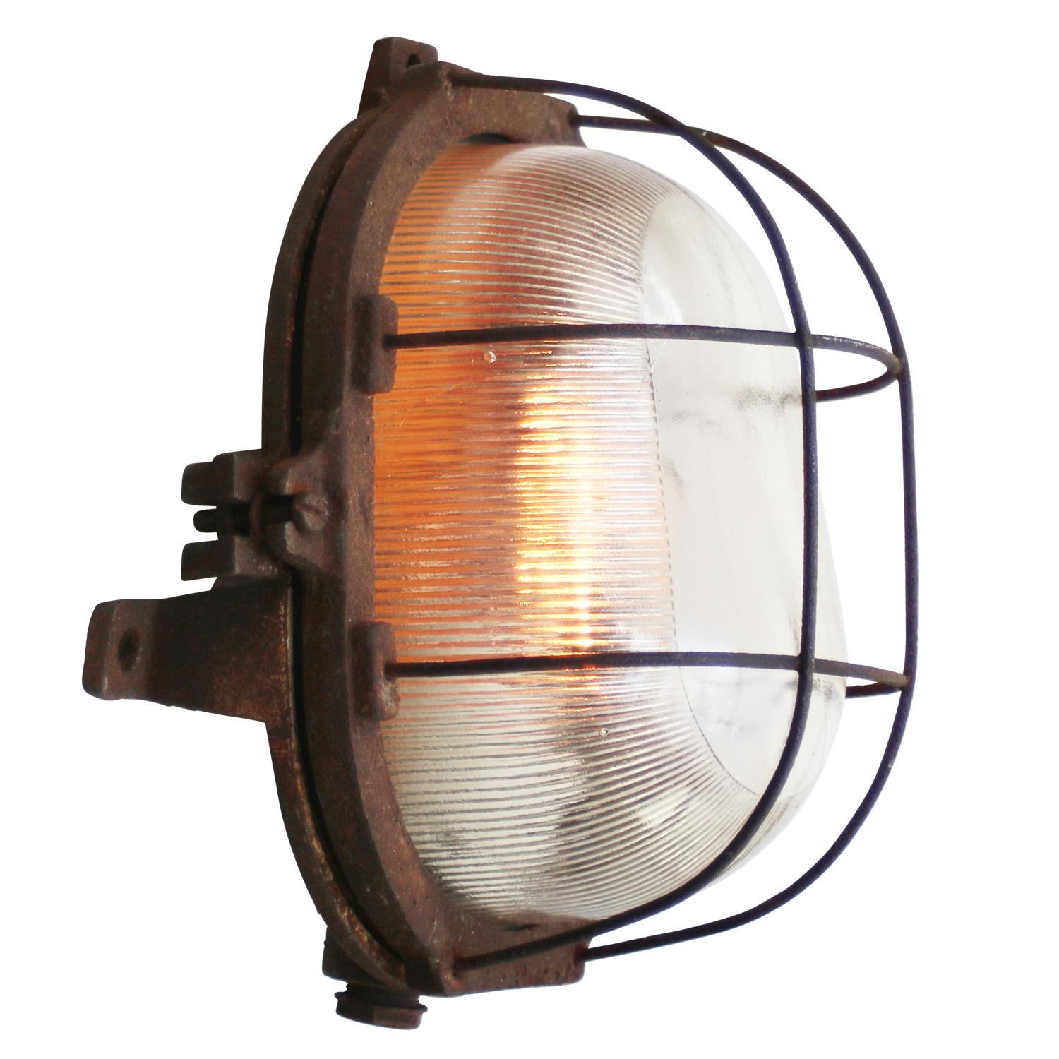 Polish Vintage Industrial Rust Cast Iron Striped Clear Glass Sconce Wall Light For Sale