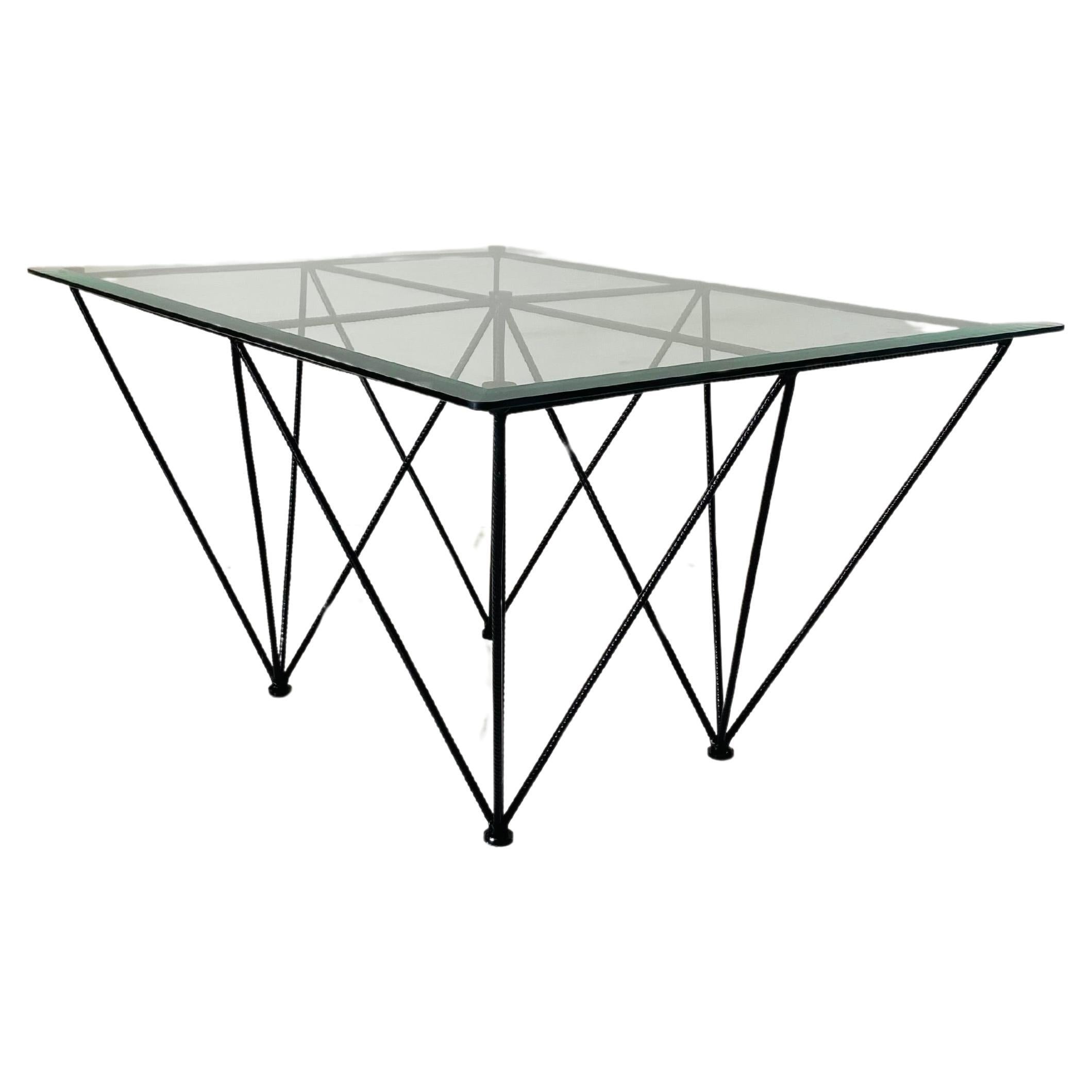Vintage Industrial Sofa Table, Italy 1970s

This 1970s Industrial Coffee Table, manufactured in Italy, combines refined design with industrial charm. Featuring a transparent beveled glass top, the table is supported by a sturdy industrial