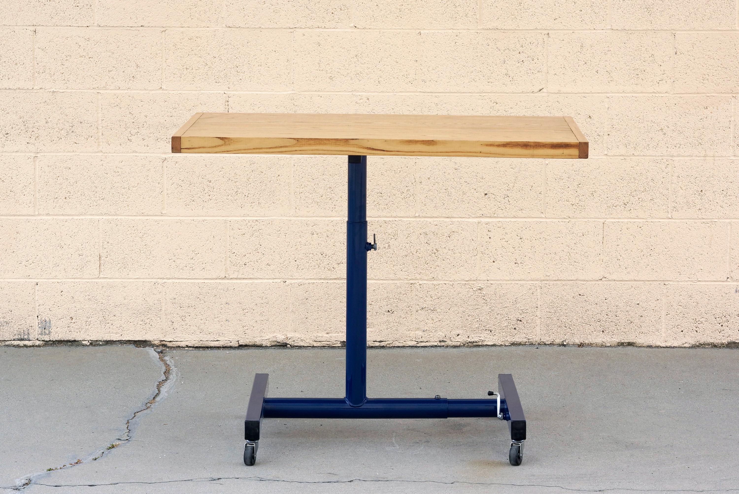 Modular and adjustable, our vintage standing desk is ready to transform the way you work. We refinished the steel base in a midnight blue (BL20) powder coat and paired it with a reclaimed ashwood top. Height adjusts from 25-34