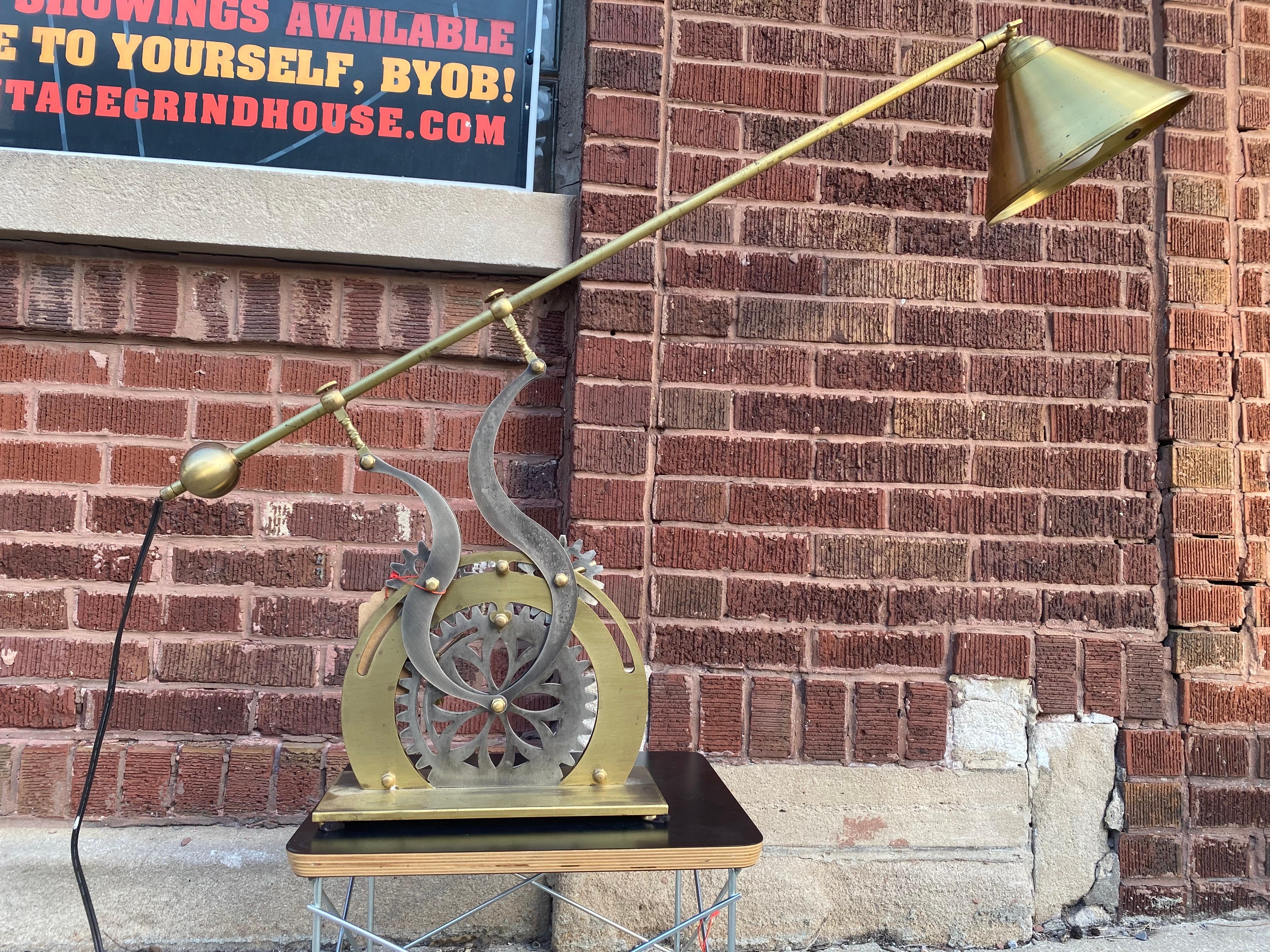 Vintage Industrial Steampunk Rotating Gear Adjustable Brass Table Lamp

This rustic, industrial, steampunk table lamp features an exposed cast iron & brass skeleton gear body and extendable retro neck. The gears make the lamp highly adjustable,