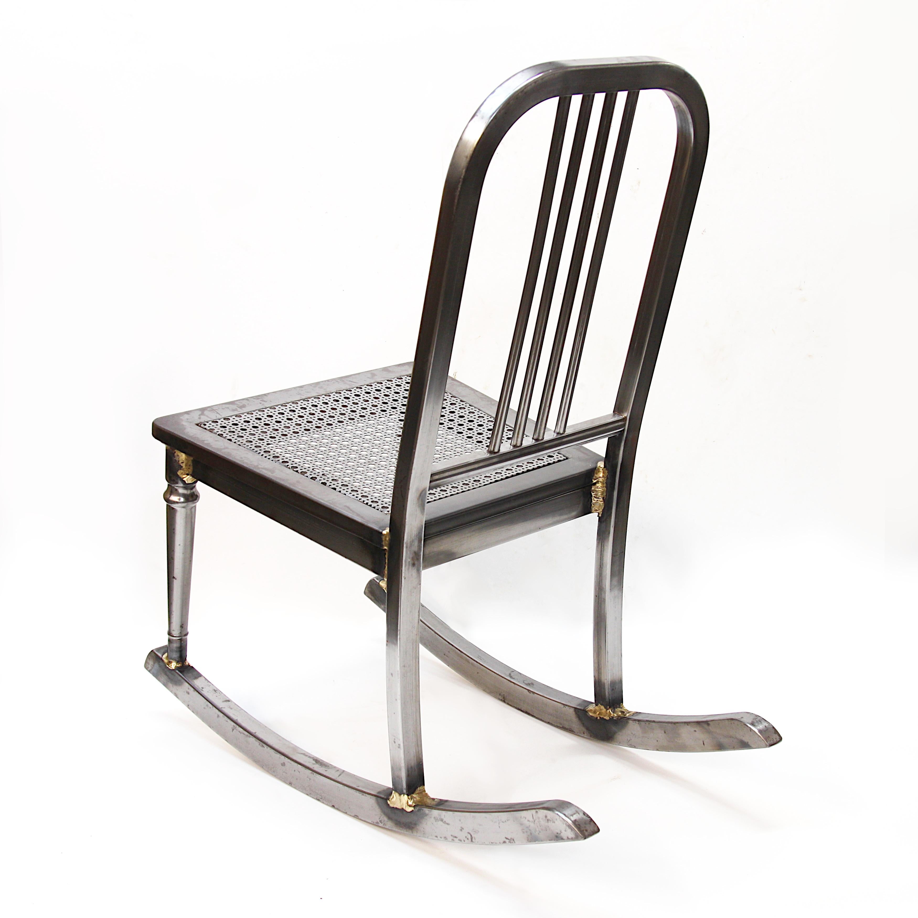 Very cool 1930's vintage rocking chair by the Simmons Mfg. Co. Chair features full steel construction with unique steel 