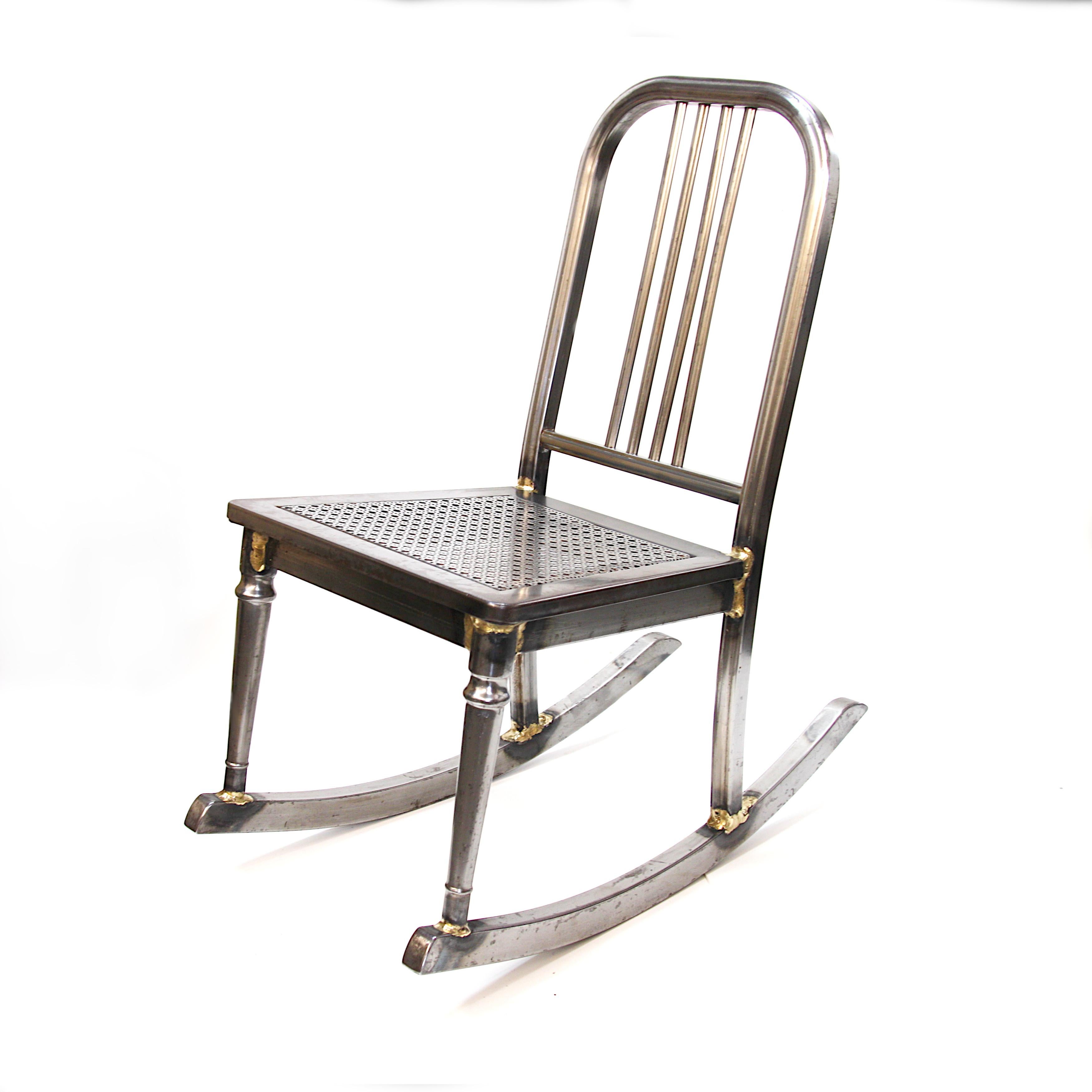 antique metal rocking chair