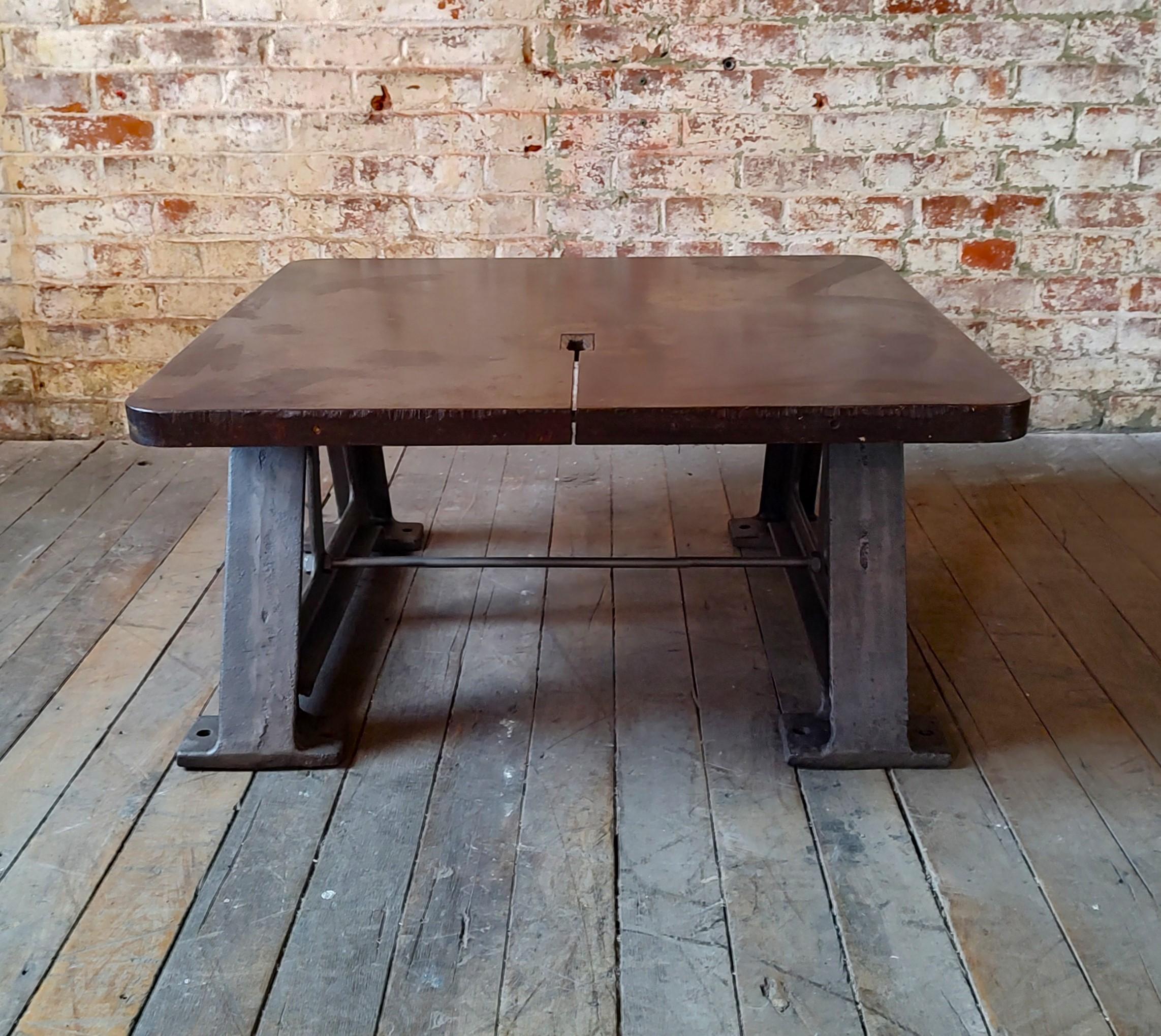 Low cast iron industrial table.

Overall Dimensions: 32
