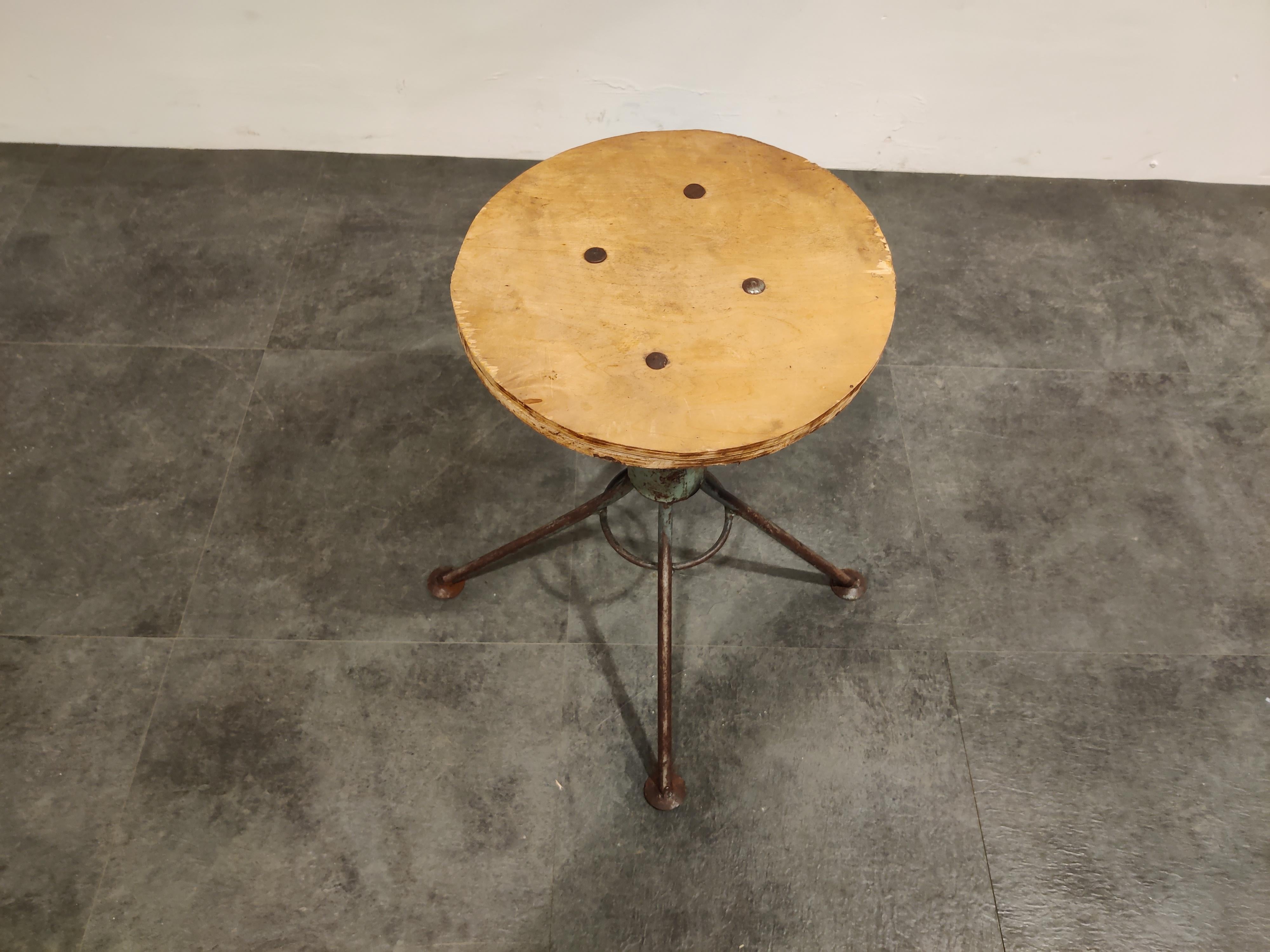 Great looking vintage factory stool with a plywood seat.

The seat height is adjustable by turning the seat. 

Good used condition,

1950s, Latvia

Dimensions:
Max height 54cm/21.25