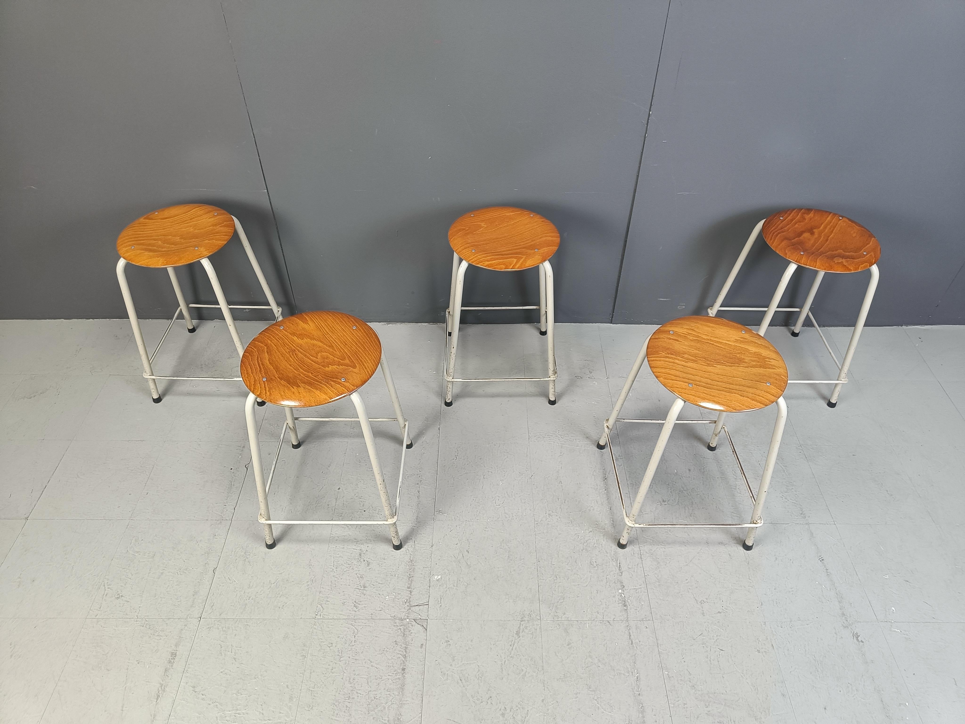 Vintage laboratory stools with round plywood seats and white metal frames.

They come from a hospitol in Belgium.

Nice patina.

1970s - Belgium

Height: 60cm
Diameter: 40cm

Ref.: 24111905

*Price is for the set of 5
*Images are part of the