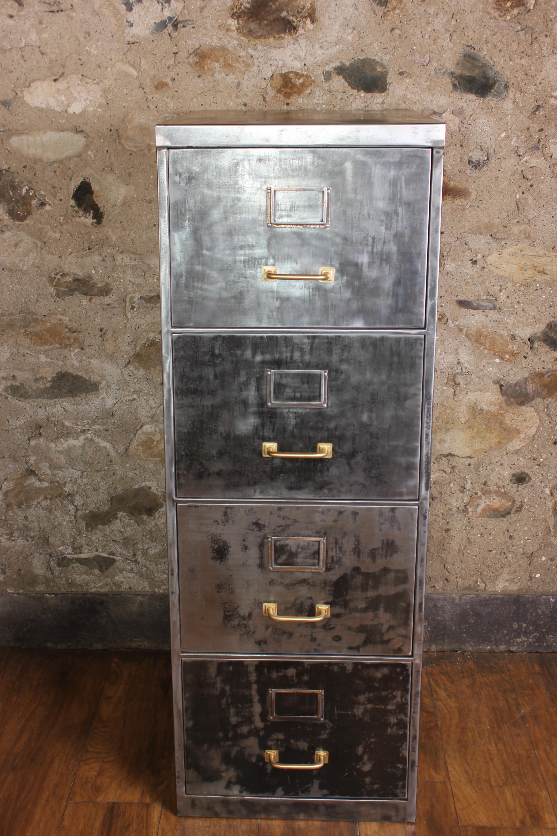 This vintage 4-drawer metal filing cabinet has been stripped back to bare metal to give it a great industrial look. This interesting cabinet is full of character and an absolute must for any home office/study. It has 4 deep and roomy drawers and