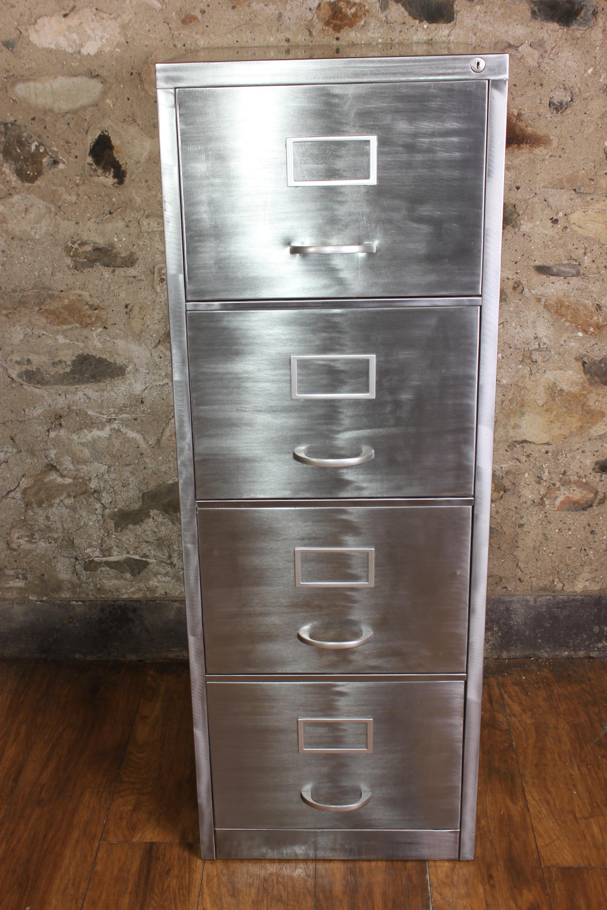 This vintage 4-drawer metal filing cabinet has been stripped back to bare metal to give it a great Industrial look. This interesting cabinet is full of character and an absolute must for any home office/study. It has 4 deep and roomy drawers and