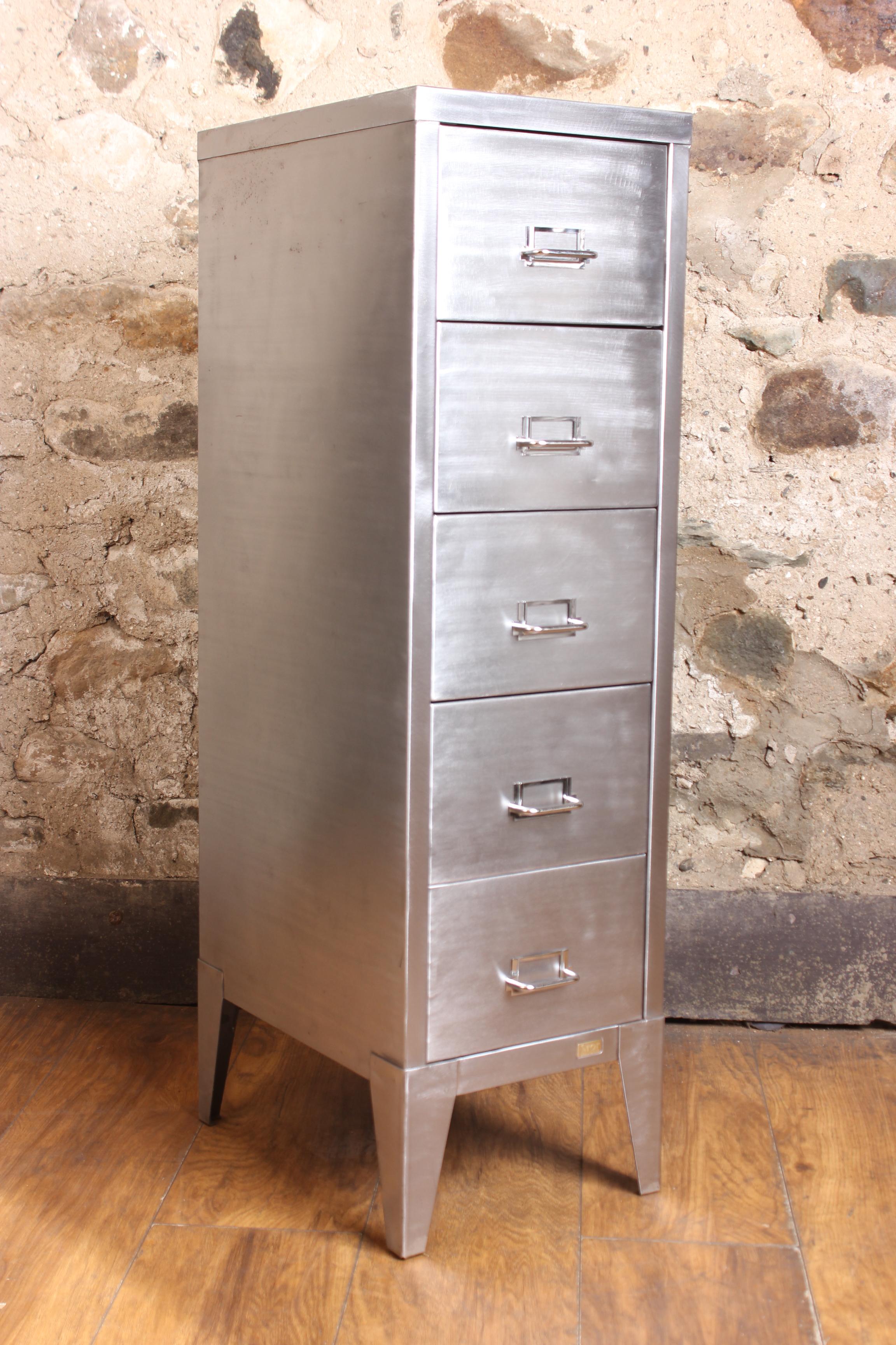 A stunning vintage 1950s industrial stripped metal 5-drawer filing cabinet. This impressive A4 size industrial design piece has been stripped back to bare metal and was manufactured in the United Kingdom by Stor all steel during the 1950s. This is a