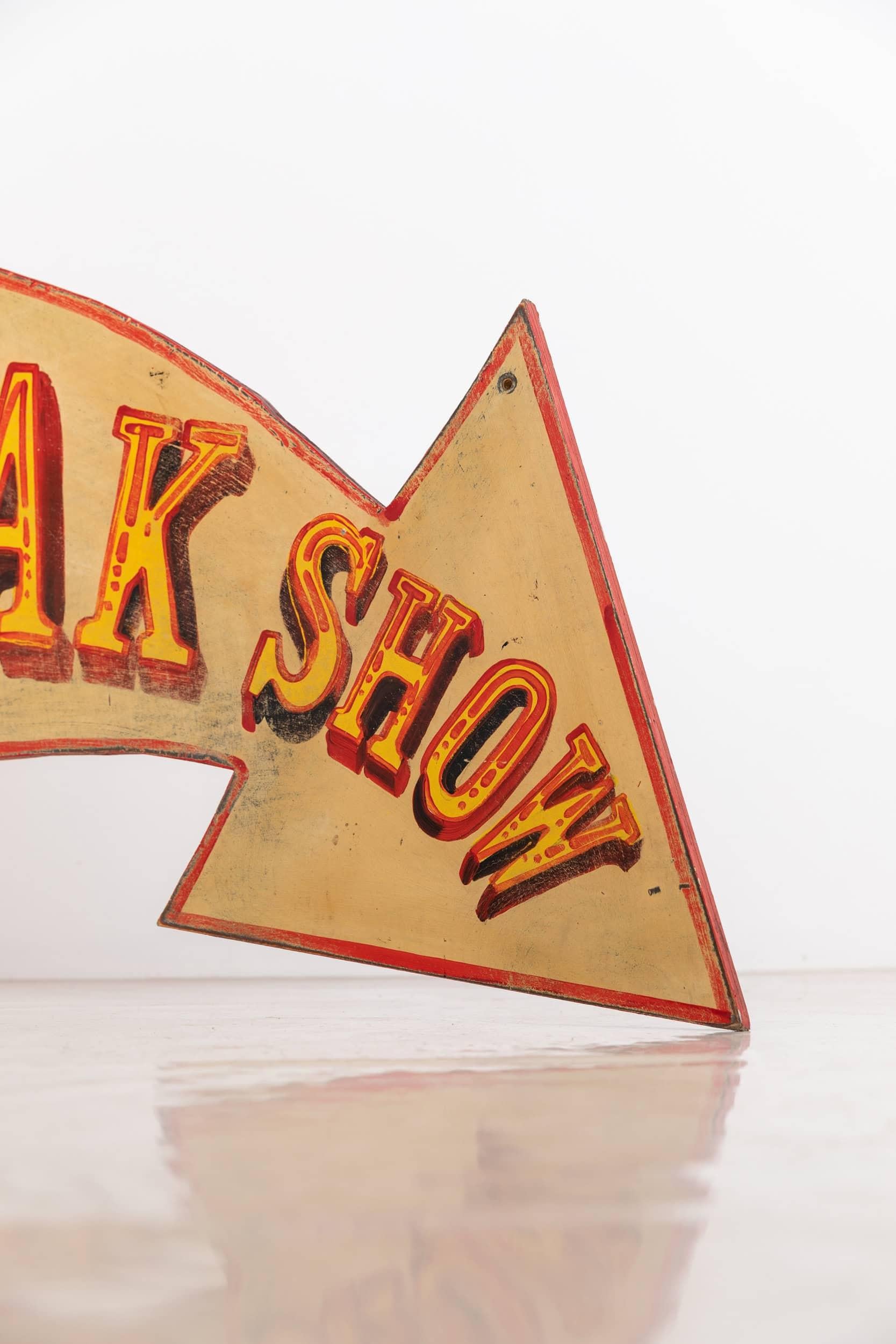 

A large hand painted fairground 'Freak Show' sign.

Decorative and eye-catching arrowed design backboard, with hand painted lettering. 
