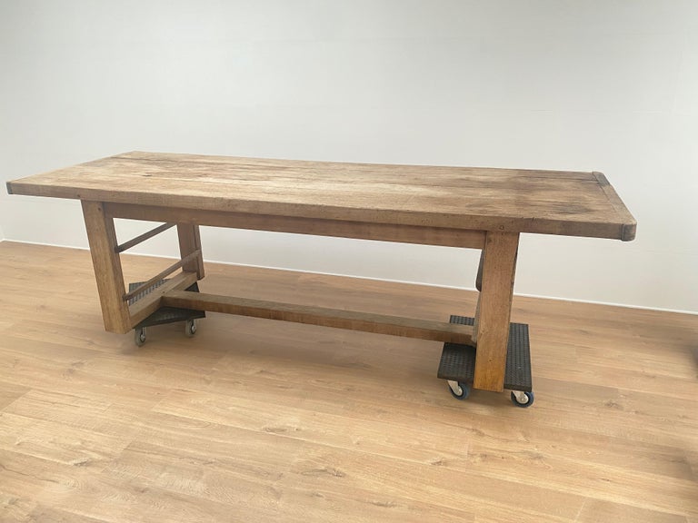 Beautiful genuine vintage Industrial work table in bleached beech wood,
France, Paris Area,1920,
great antique patina and warm and worn shine of the wood,
the table top is 6 cm thick.