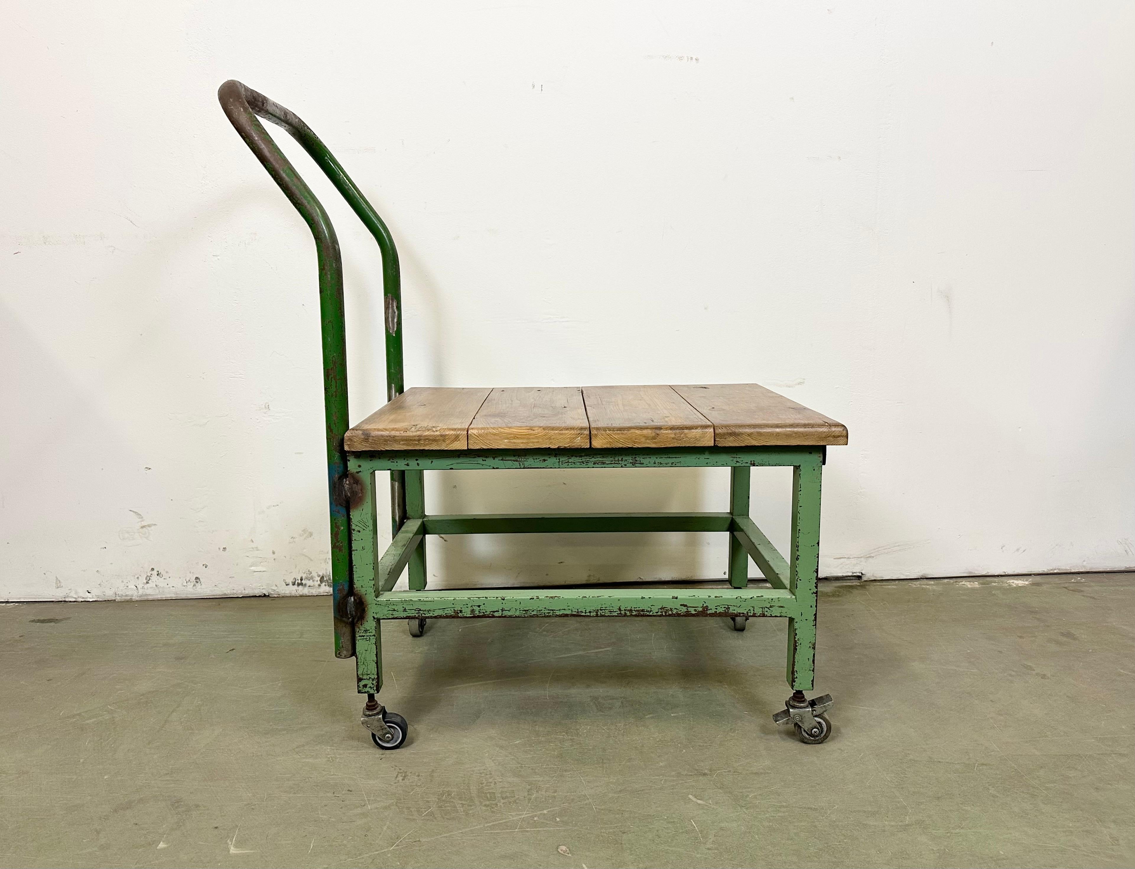 - Vintage Industrial trolley made in former Czechoslovakia during the 1960s
- Green iron construction, solid wooden plate 
- 4 original wheels 
Adittional dimensions:
- Wooden plate : 65cm x 47 cm
- Height of the wooden plate : 46 cm
- Height of the