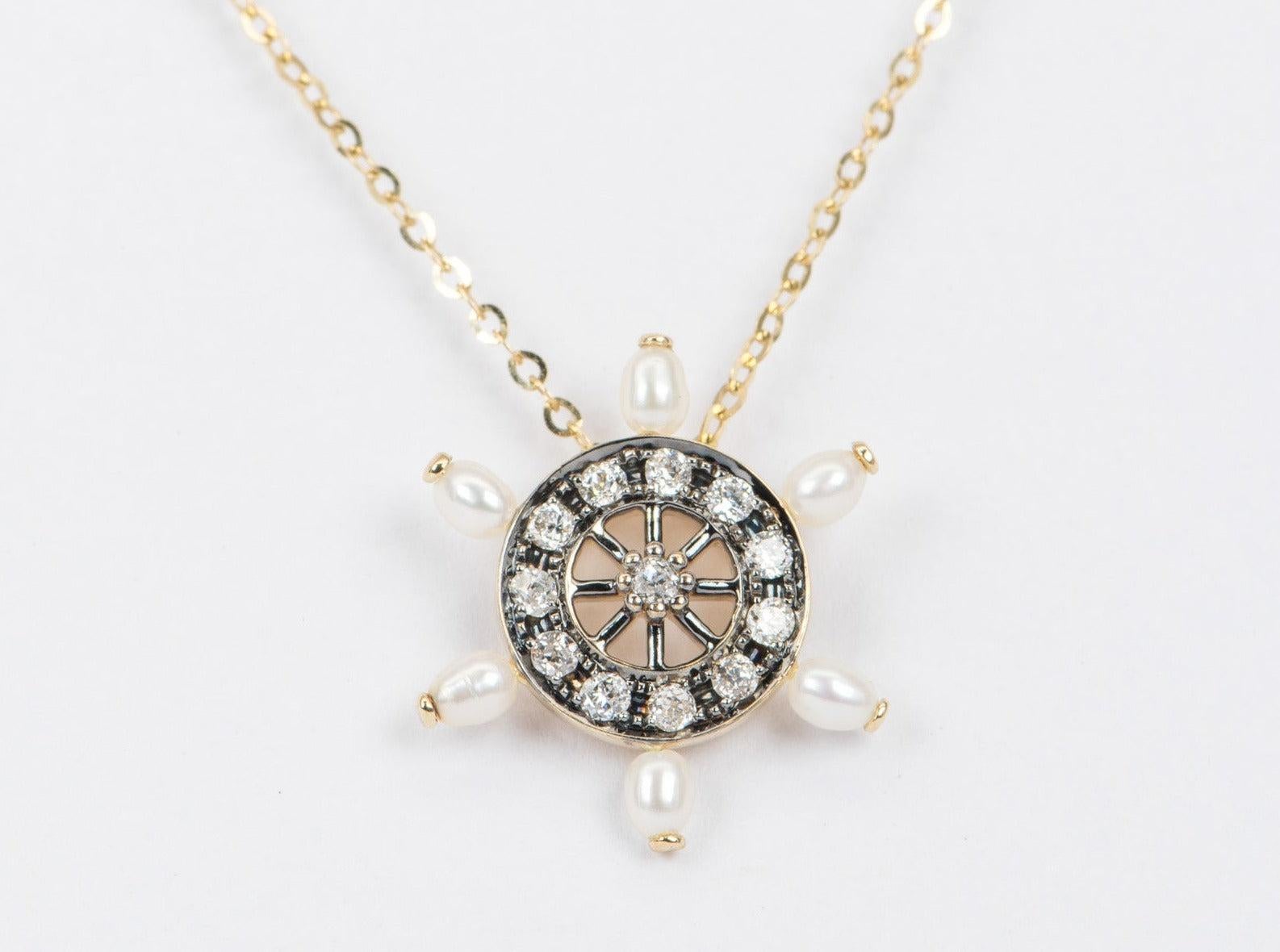 ♥ Solid 14k yellow gold vintage inspired pearl and diamond wheel pendant
♥ The item measures 19.8mm in length, 17.5mm in width, and 13.2mm in height.

♥ Note: The necklace chain is sold separately. You can purchase the solid 14K gold chain as an