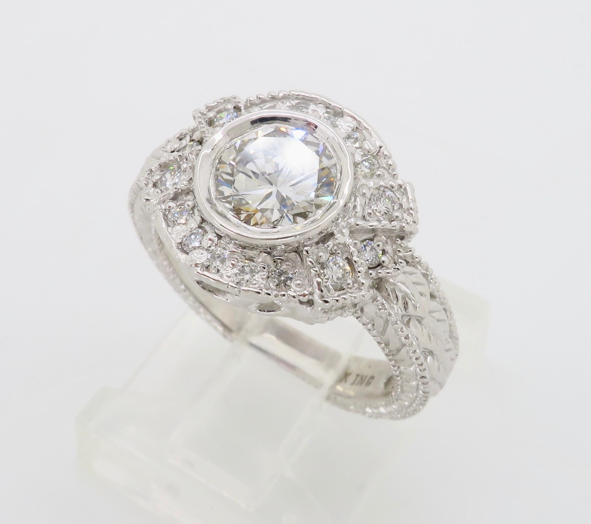 Highly detailed vintage inspired diamond ring with approximately 1.27ctw of Round Brilliant cut diamonds. 

Center Diamond Carat Weight: Approximately .92CT
Center Diamond Cut: Round Brilliant Cut
Center Diamond Color: I-J
Center Diamond Clarity: