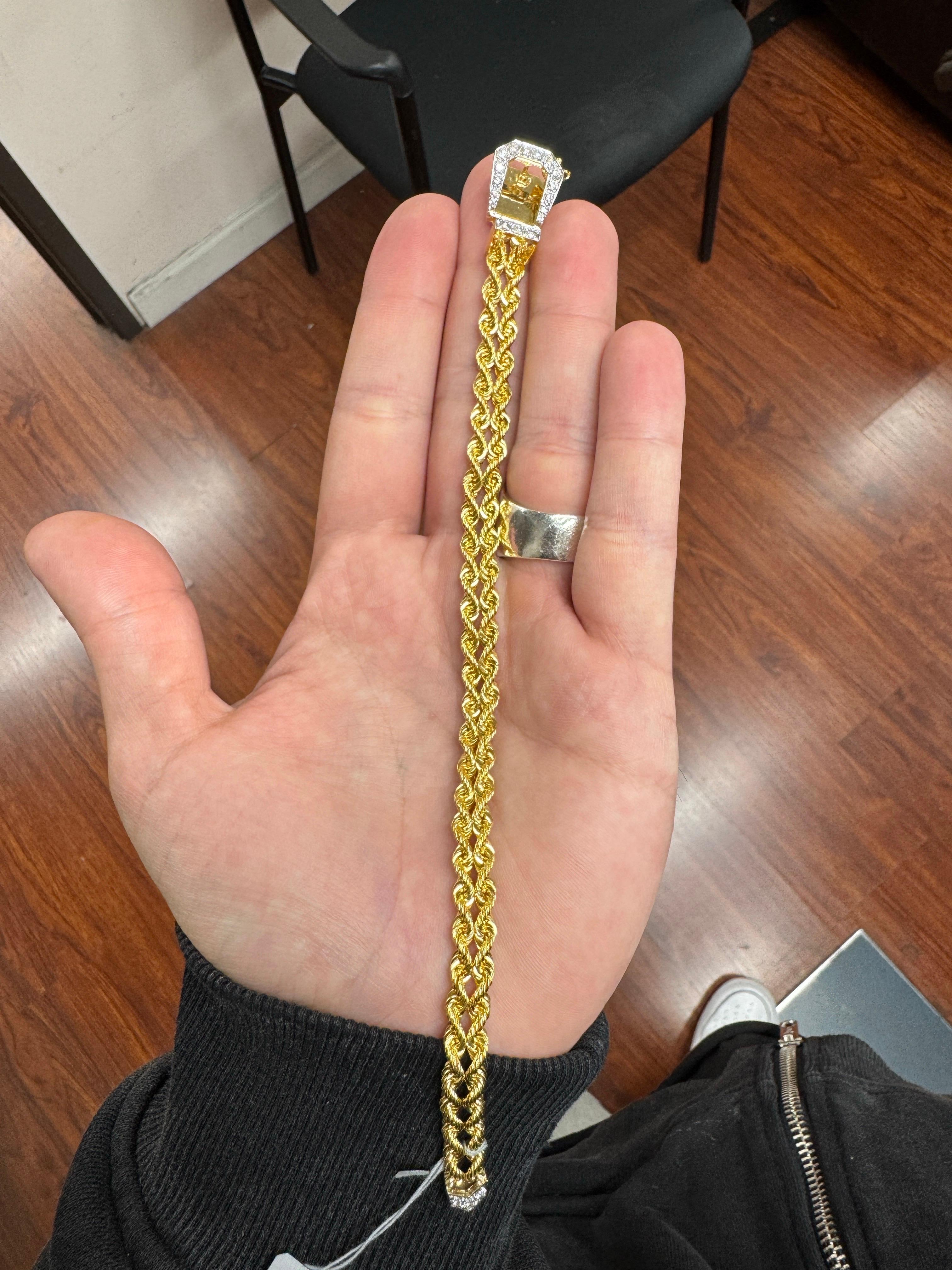 Vintage-Inspired 14k Yellow Gold Double Chain Belt Buckle Bracelet with Diamonds – 26.70g

Elevate your collection with this bold and distinctive 14k yellow gold bracelet, designed in a striking belt buckle motif. Showcasing masterful craftsmanship,