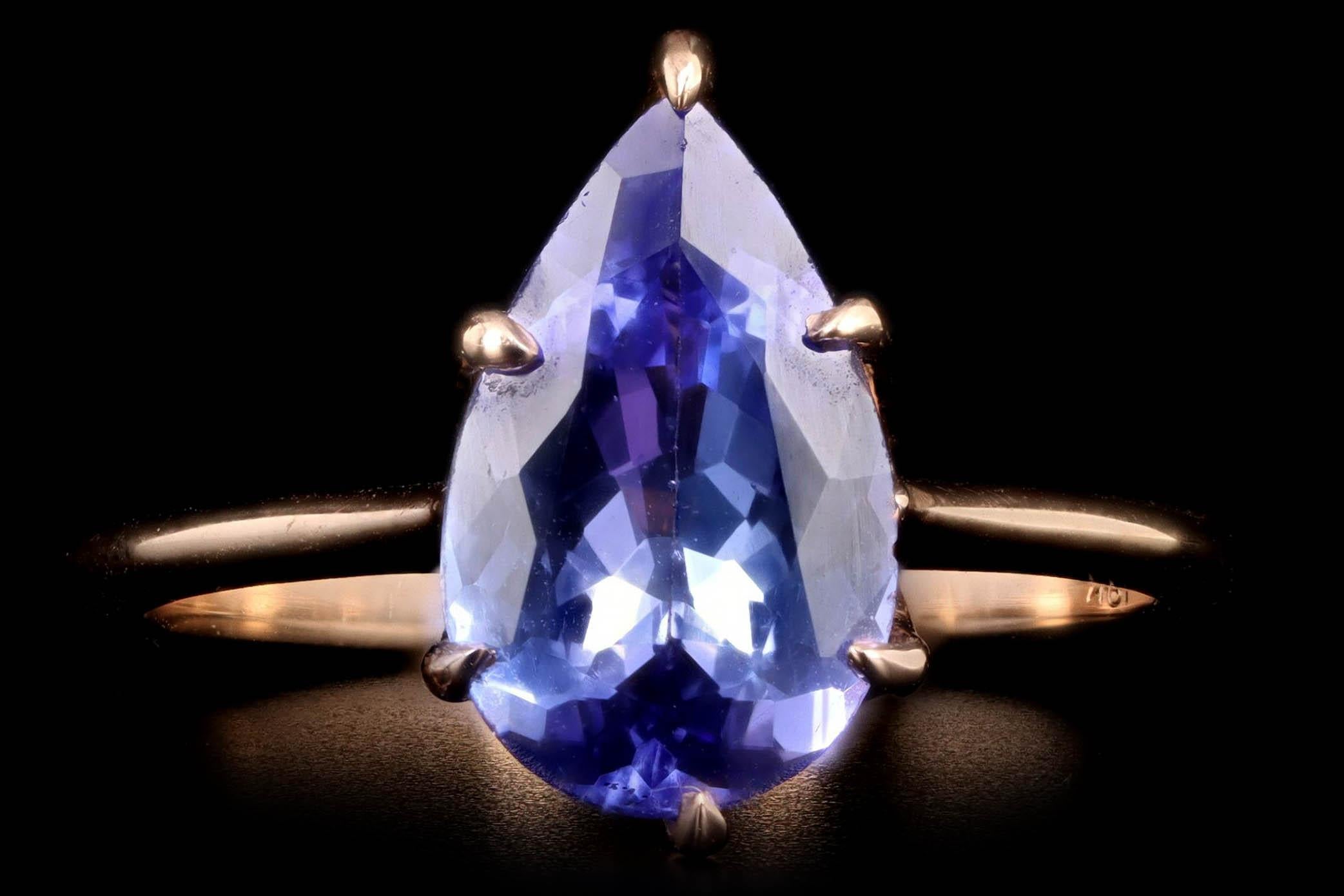 Era: New Vintage Inspired

Composition: 18K Rose Gold

Primary Stone: Pear Cut Tanzanite

Carat Weight: Approximately 2.14 Carats

Ring Size: 6.5

Ring Weight: 3.1 Grams

Item Barcode: 495846