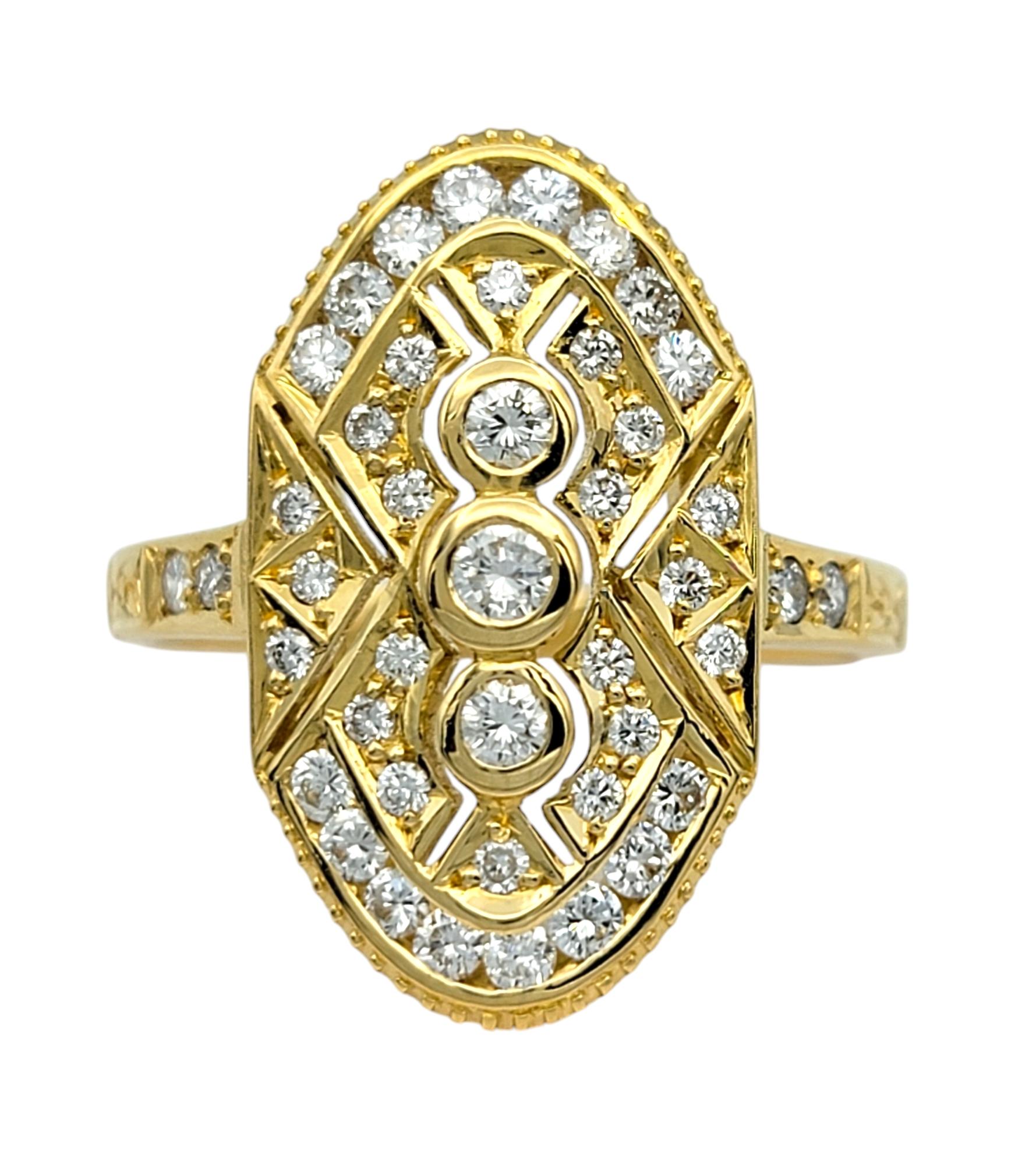 Ring Size: 6.75

Discover the allure of timeless elegance with this diamond ring, beautifully crafted in 18 karat yellow gold. Featuring a vintage-inspired design, the intricate detailing and shimmering diamonds create a captivating display of