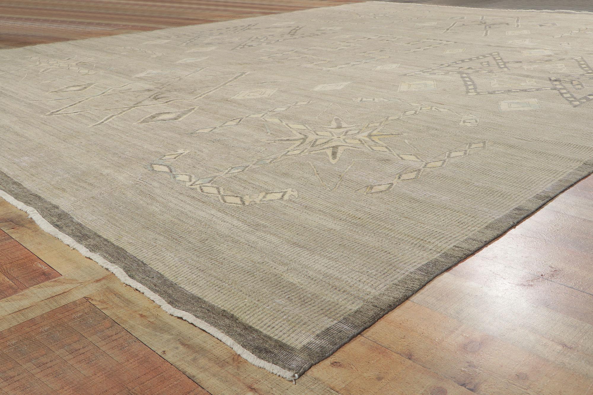 Tapis vieilli d'inspiration vintage avec style tribal 1