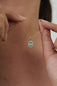 Vintage-Inspired Emerald & Diamond Halo Sunburst Pendant in 14K Yellow Gold