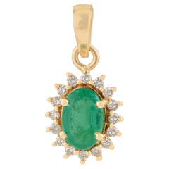 Vintage-Inspired Emerald & Diamond Halo Sunburst Pendant in 14K Yellow Gold