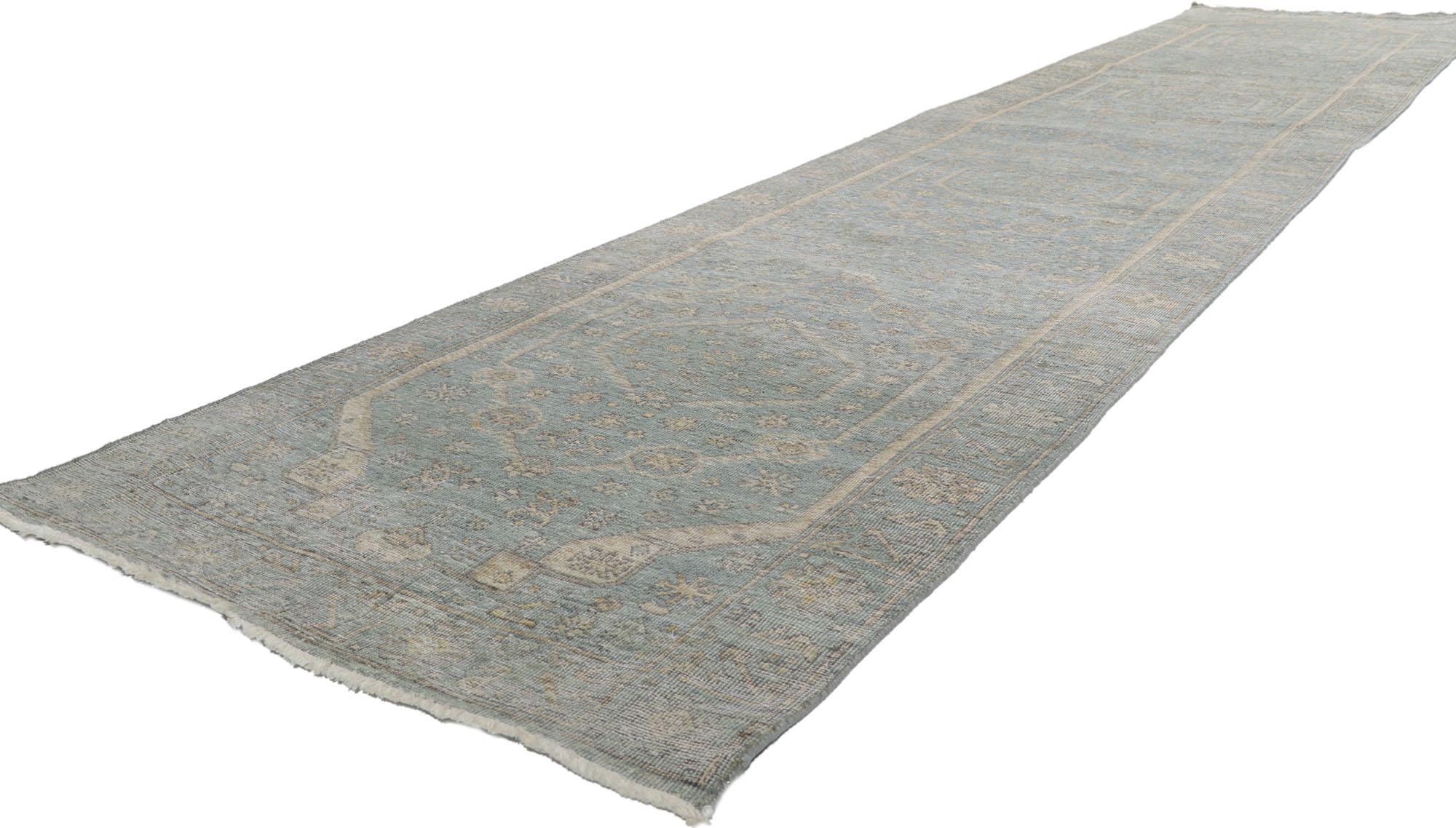 30723 Vintage-Inspired Modern Oushak Rug, 02'11 x 13'11.
Emanating traditional sensibility and rugged beauty with a neutral color palette, this hand-knotted wool distressed Indian Oushak runner creates an inimitable warmth and calming ambiance. The