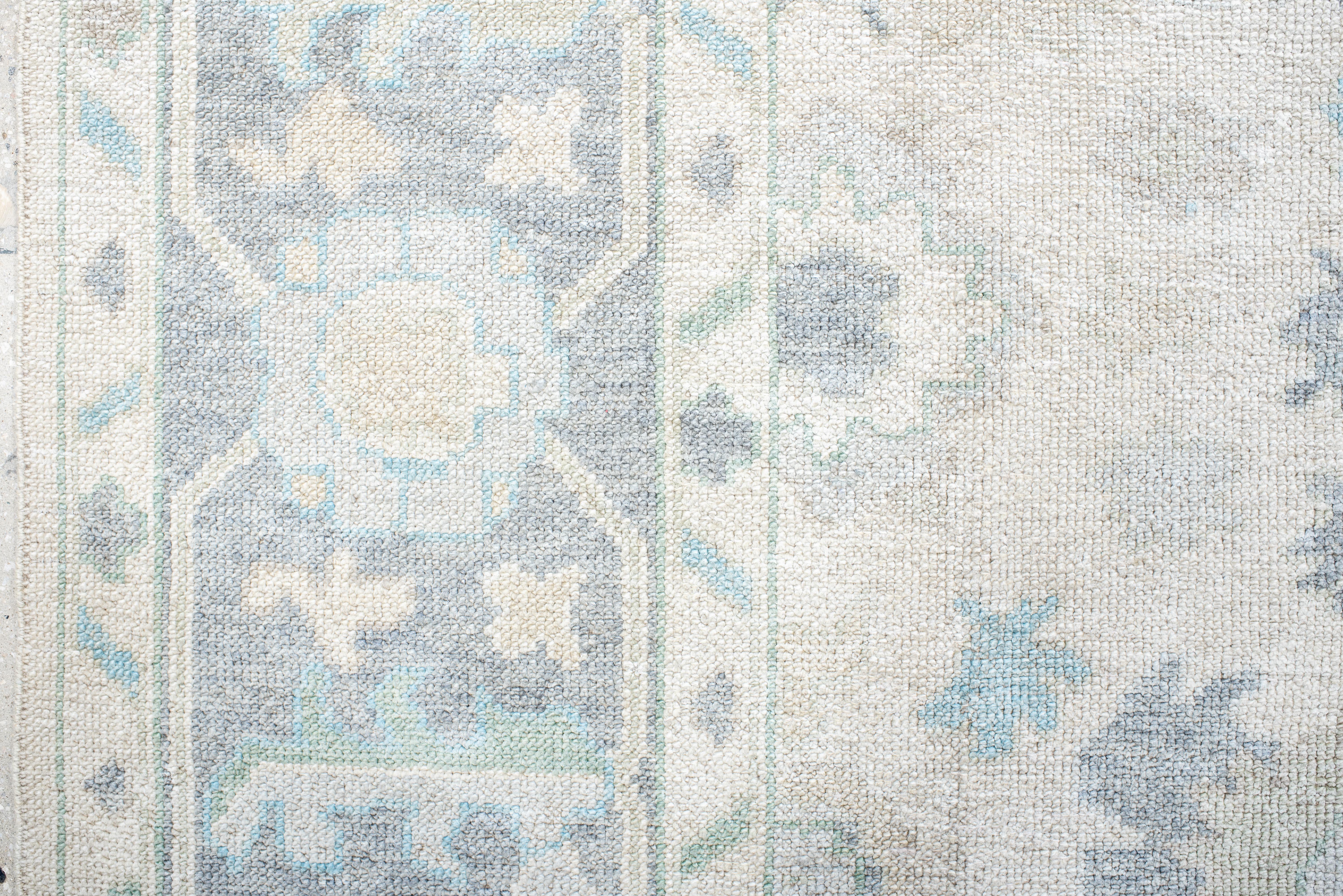 Wool Vintage Inspired Oushak Rug in Faded Ivory and Soft Blues For Sale