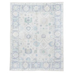 Vintage Inspired Oushak Rug in Faded Ivory and Soft Blues