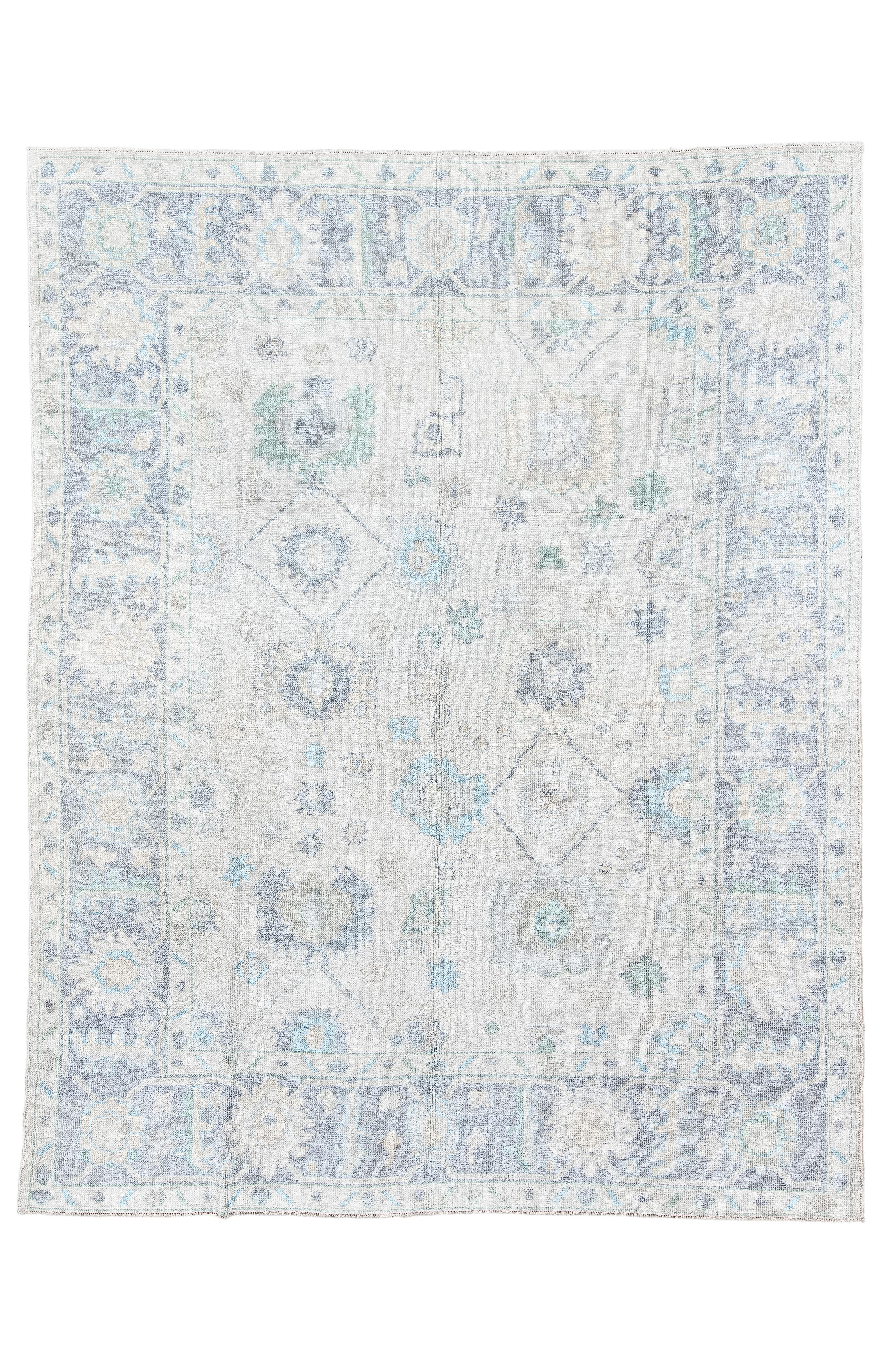 Vintage Inspired Oushak Rug in Faded Ivory and Soft Blues For Sale