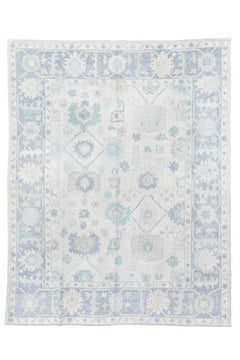 Vintage Inspired Oushak Rug in Faded Ivory and Soft Blues