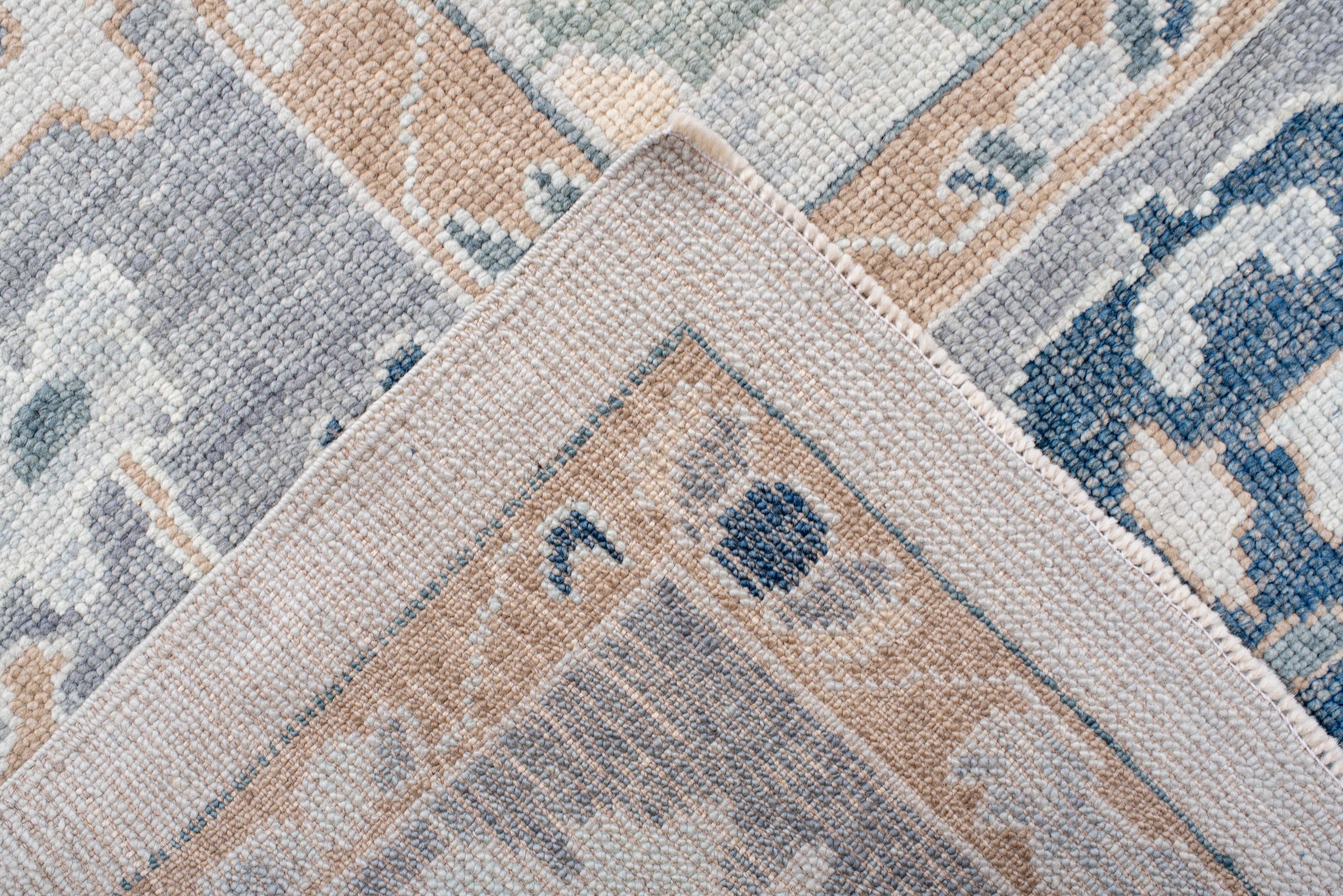 Contemporary Vintage Inspired Oushak Rug in Soft Greys and Muted Earth Tones For Sale
