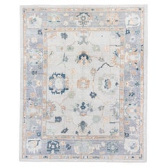 Vintage Inspired Oushak Rug in Soft Greys and Muted Earth Tones