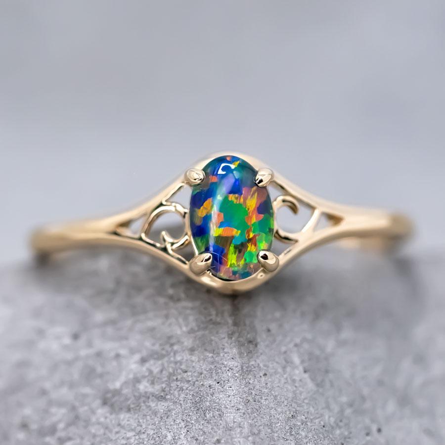 Vintage Inspired Oval Australian Triplet Opal Engagement Wedding Ring 18K Yellow Gold.


Free Domestic USPS First Class Shipping! Free Gift Bag or Box with every order!

Opal—the queen of gemstones, is one of the most beautiful gemstones in the